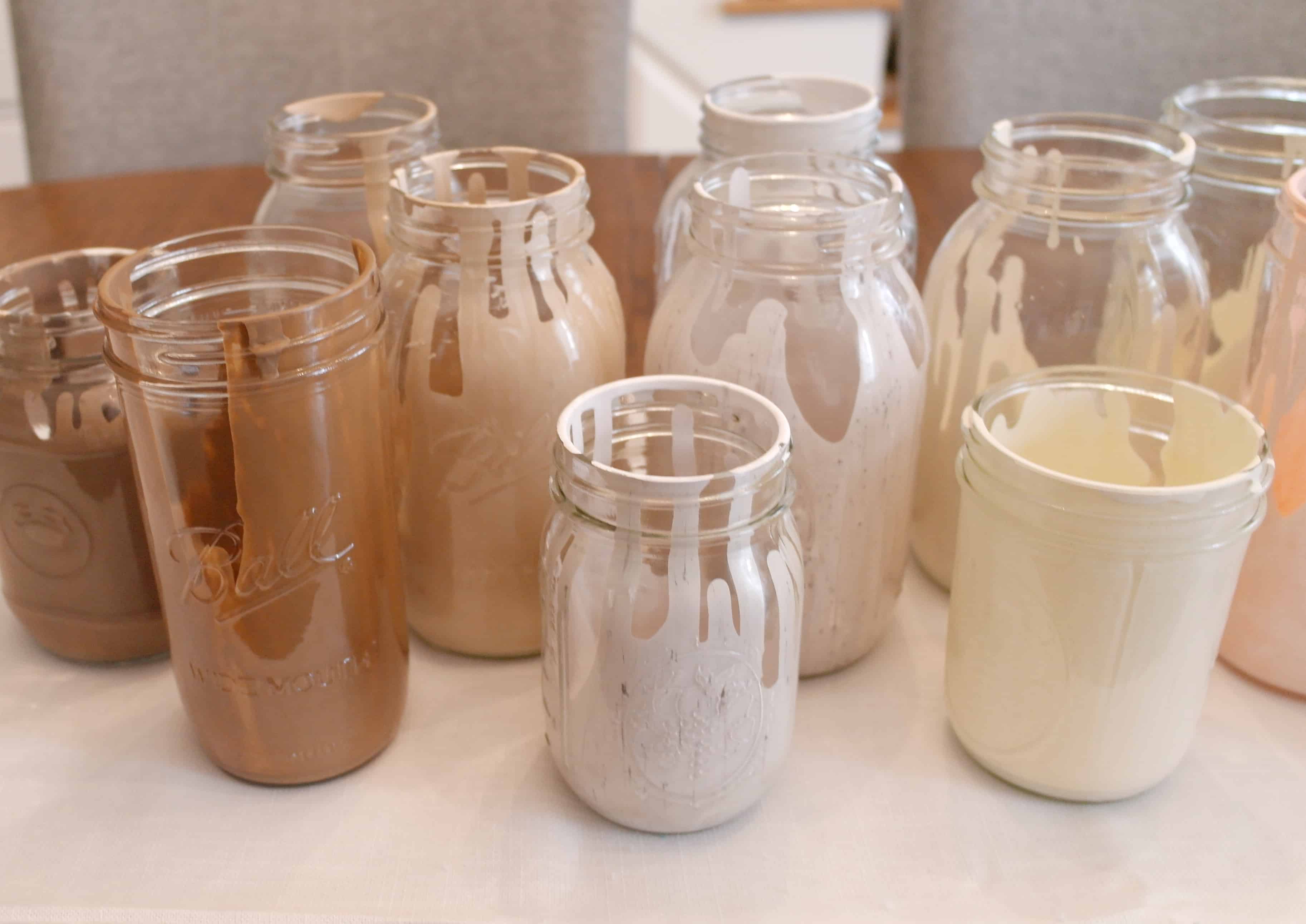 painted jars on table