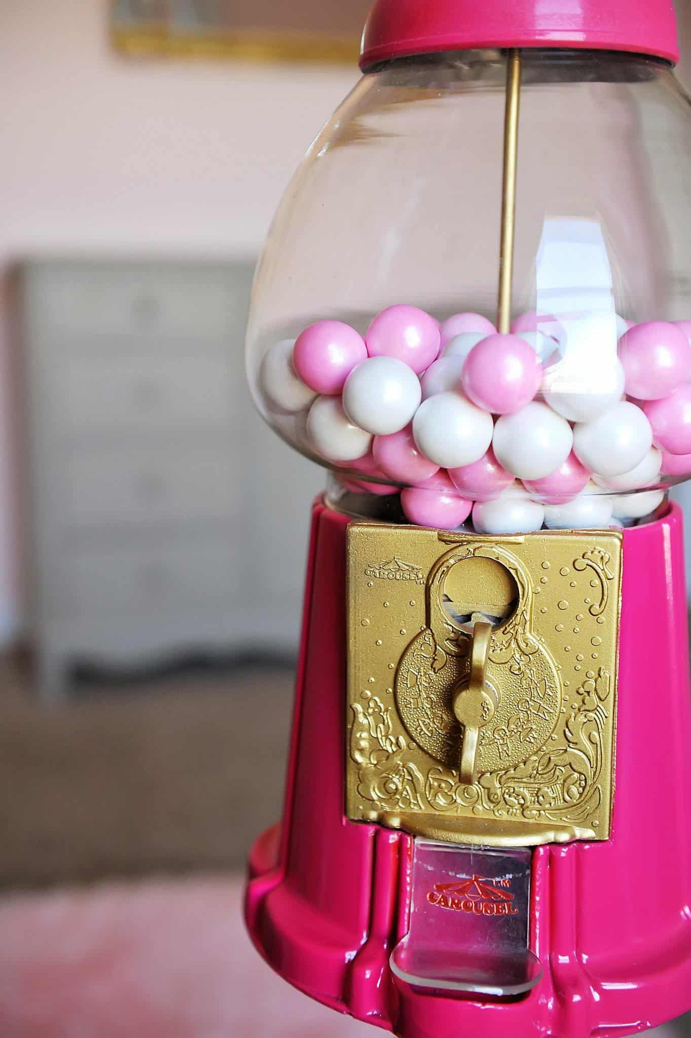 pink and gold gumball machine