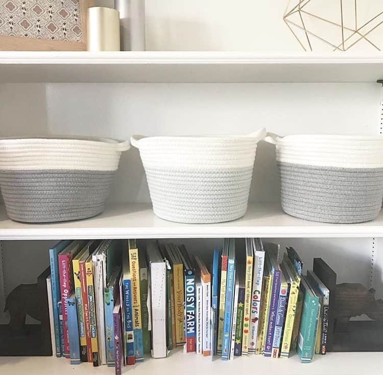 shelves with rope baskets and children's books | Toy Storage Guide 