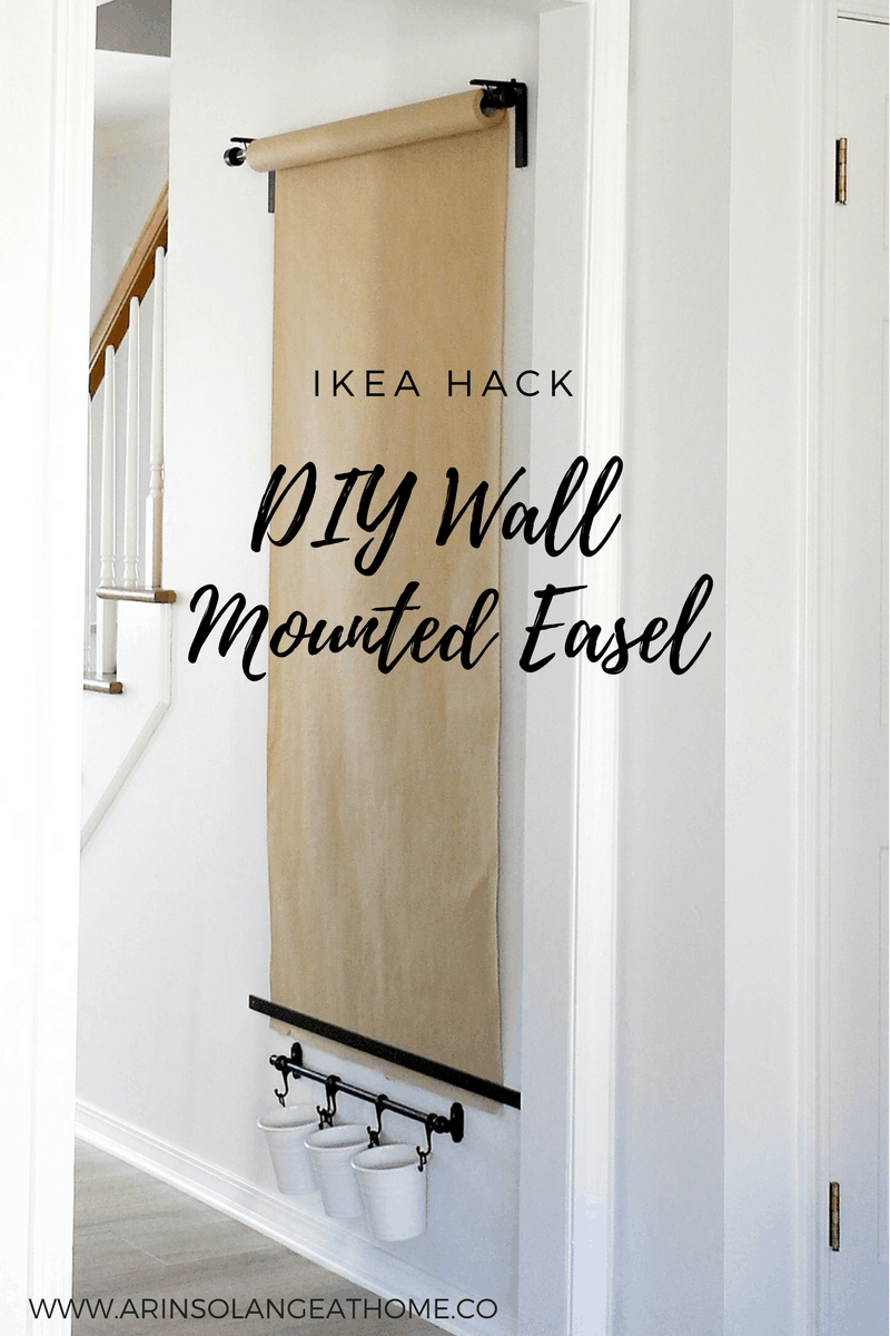 A wall mounted easel roll on a wall. An Ikea Hack to DIY your very own Wall Mounted Easel. 