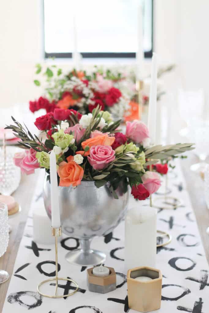 fresh flowers in antique silver vases