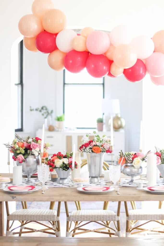 floral tablescape with balloons over