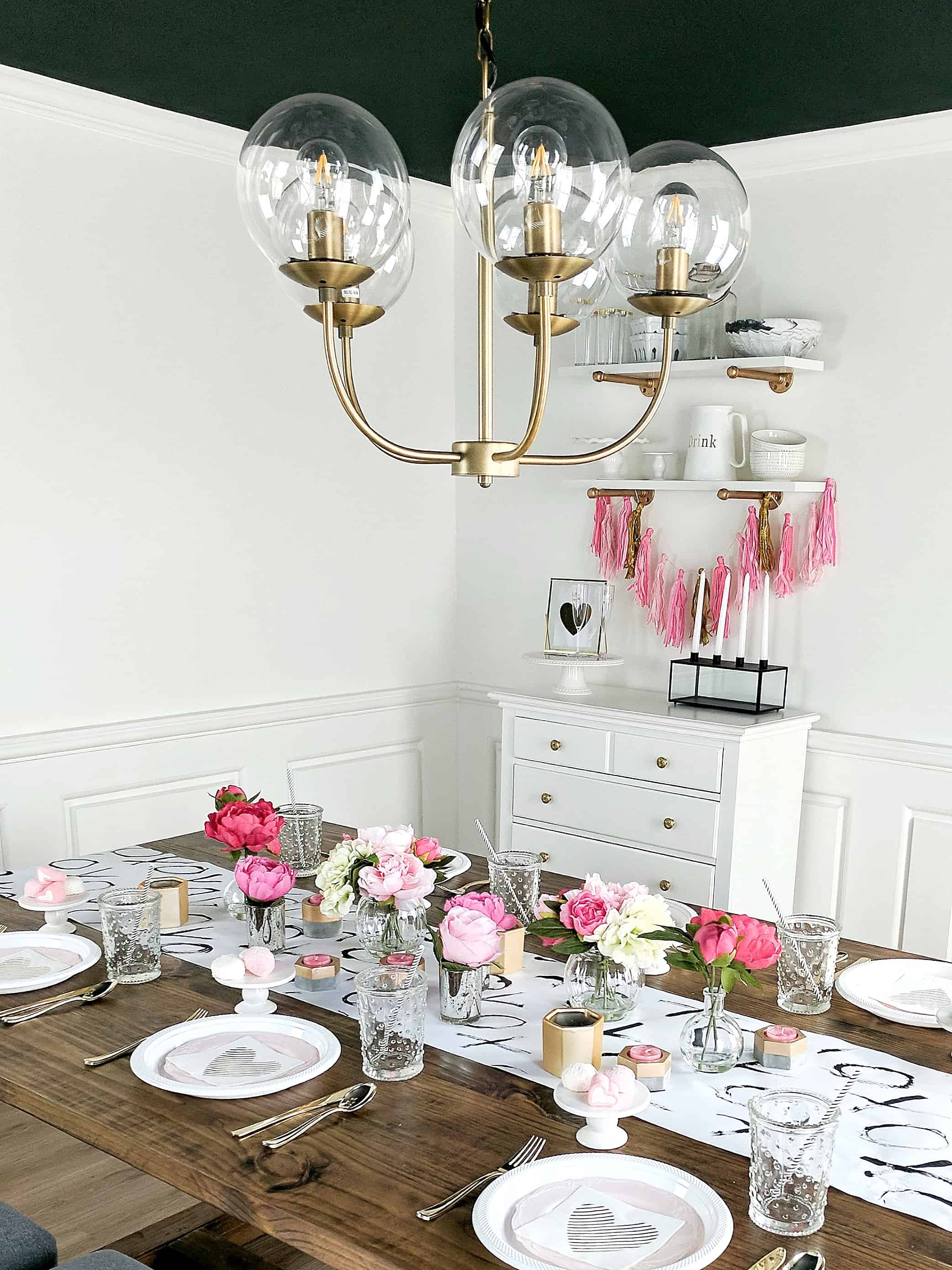 white room with gold chandelier and floral tablesetting - Valentine's Day Party 