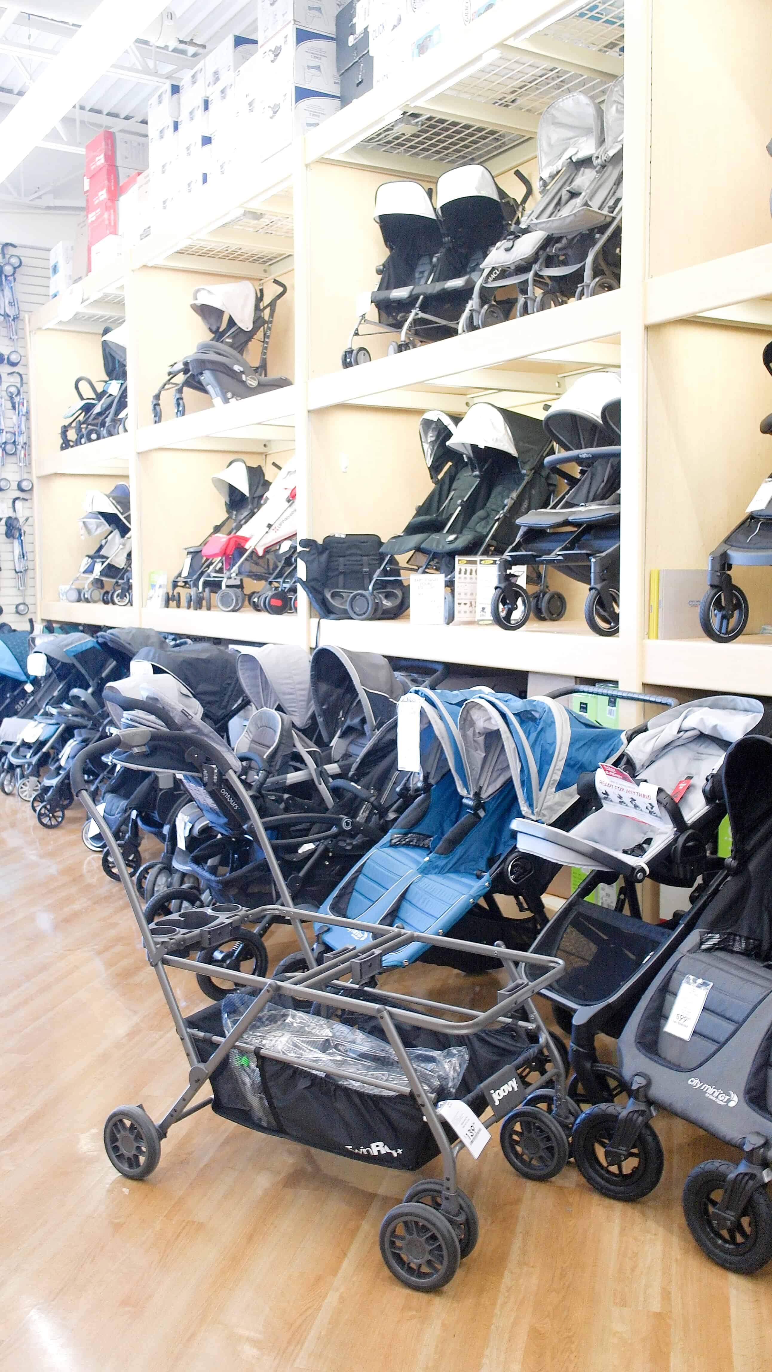 strollers on shelves at BuyBuy Baby | Buying a Stroller 