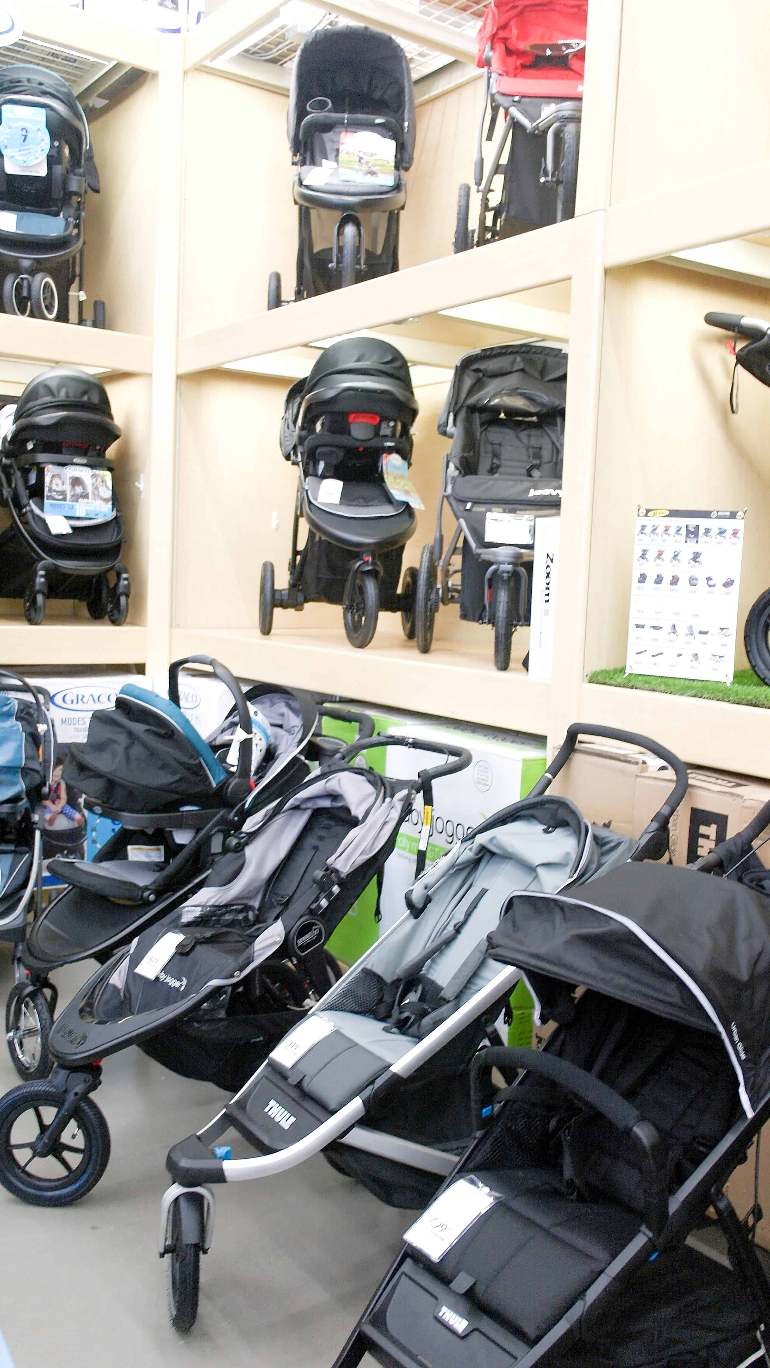 strollers on shelves at BuyBuy Baby | Buying a Stroller 