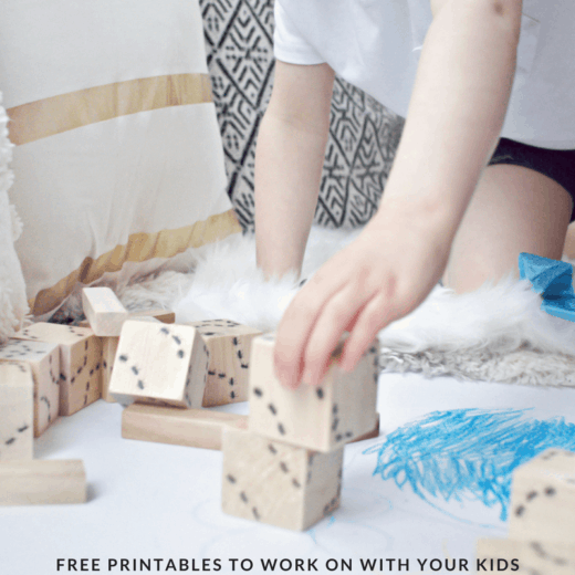 toddler boy playing with blocks