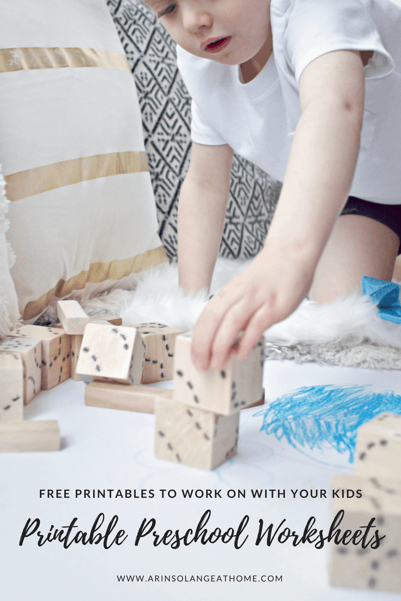 toddler boy playing with blocks 