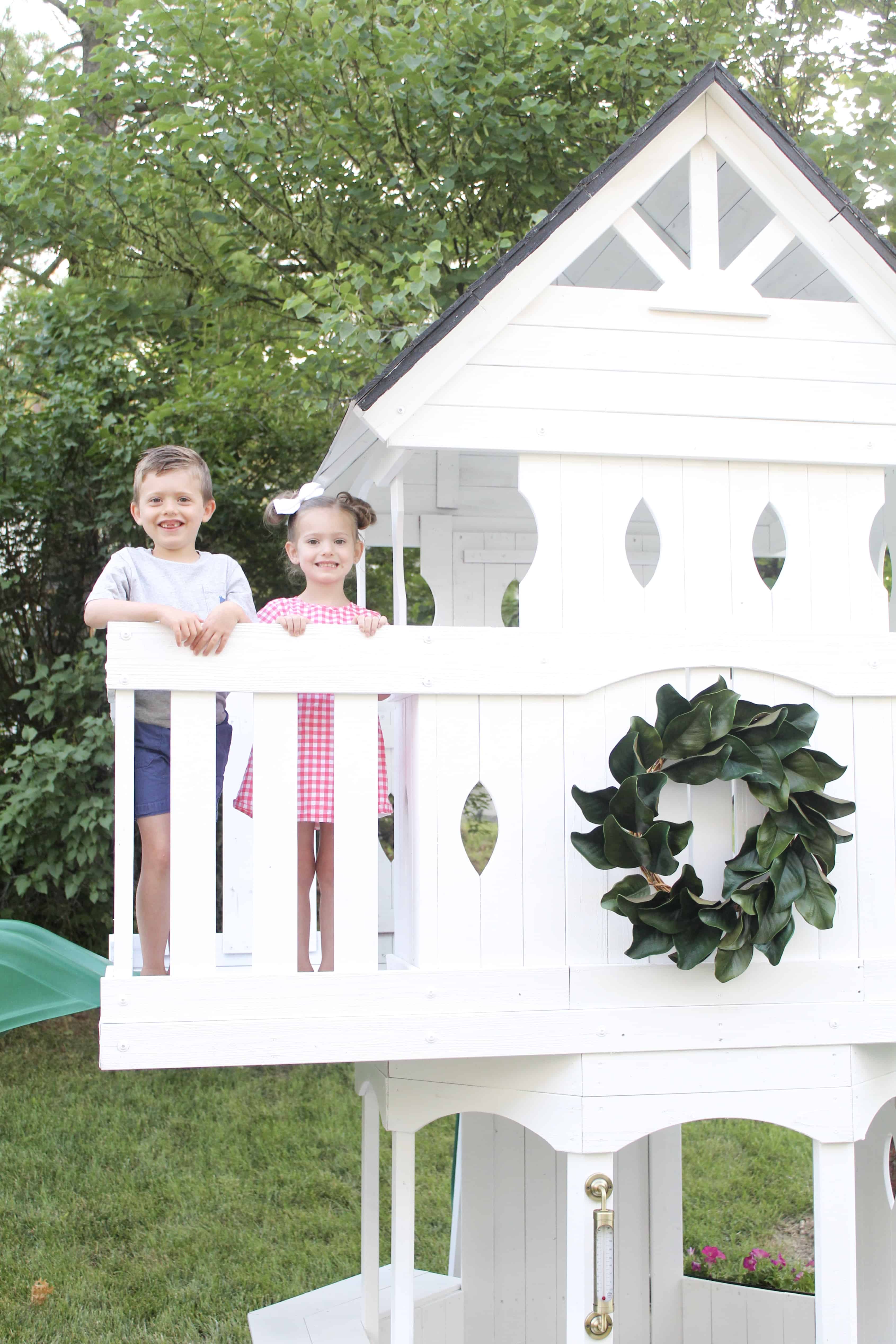 Kids on white swingset | DIY Swingset Makeover 