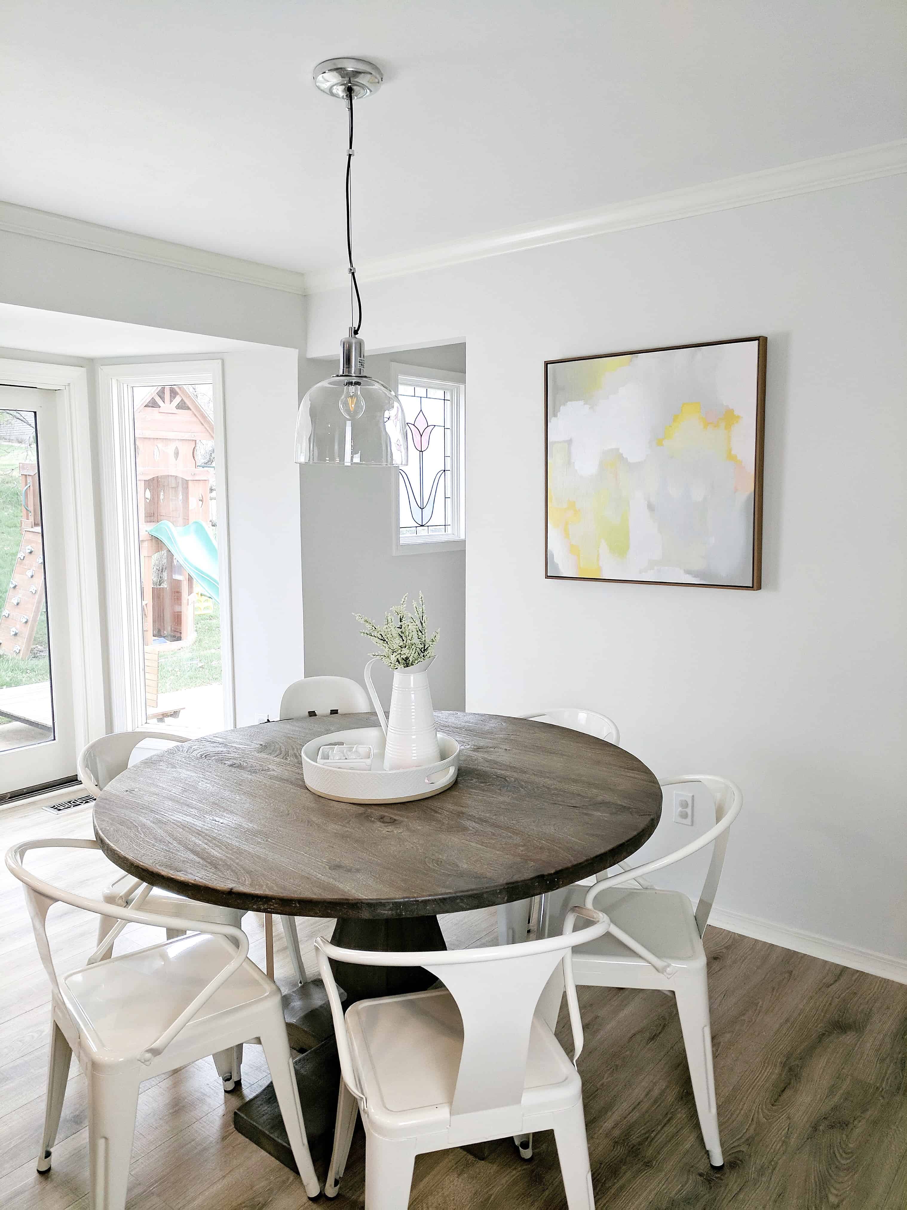 kitchen table with white metal chairs