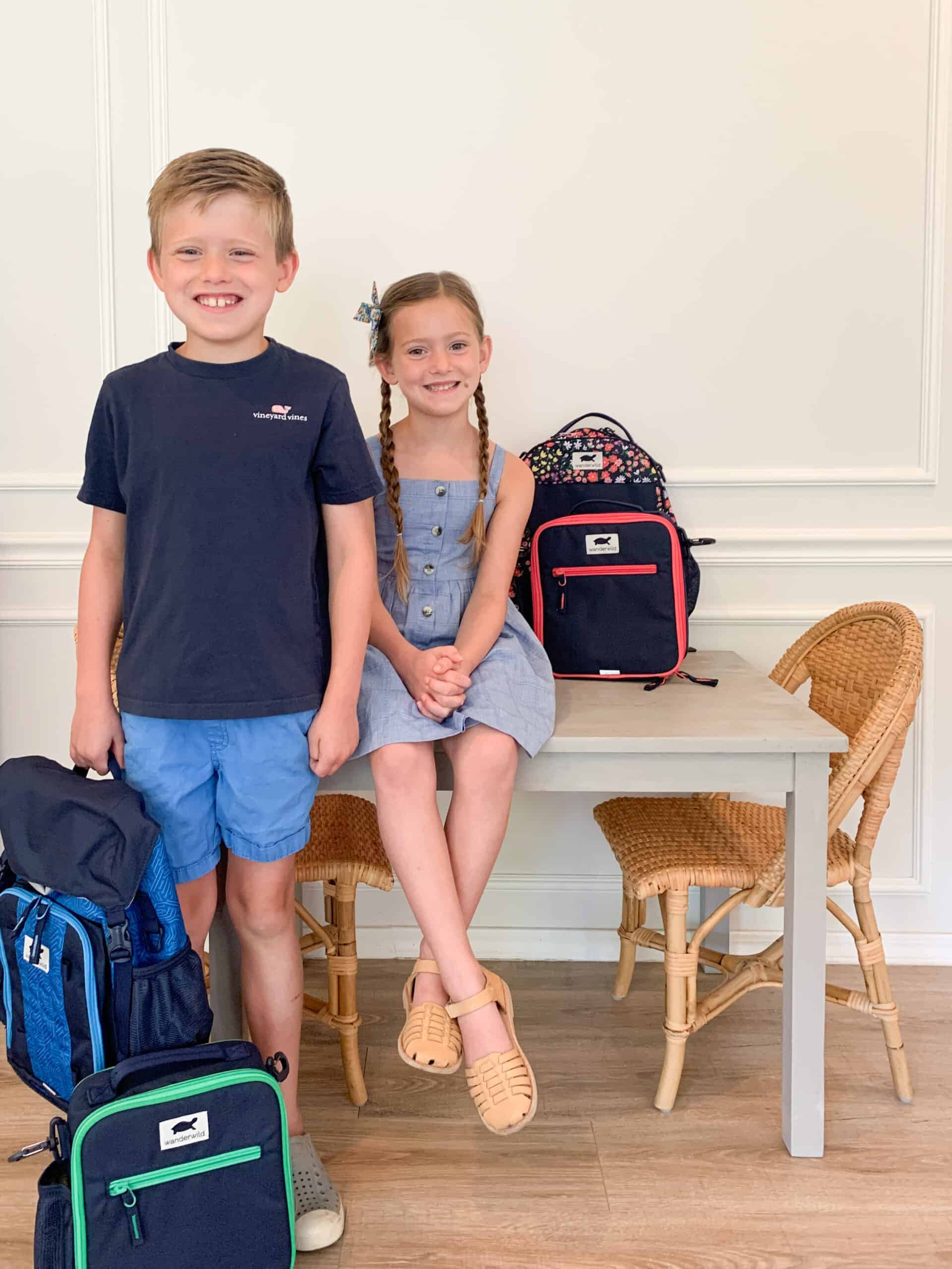 kids with their kindergarten backpacks for back to school