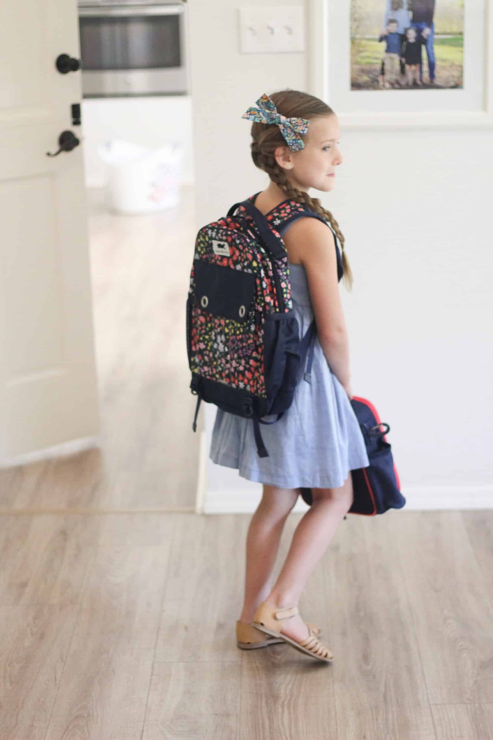 girl with kindergarten backpack