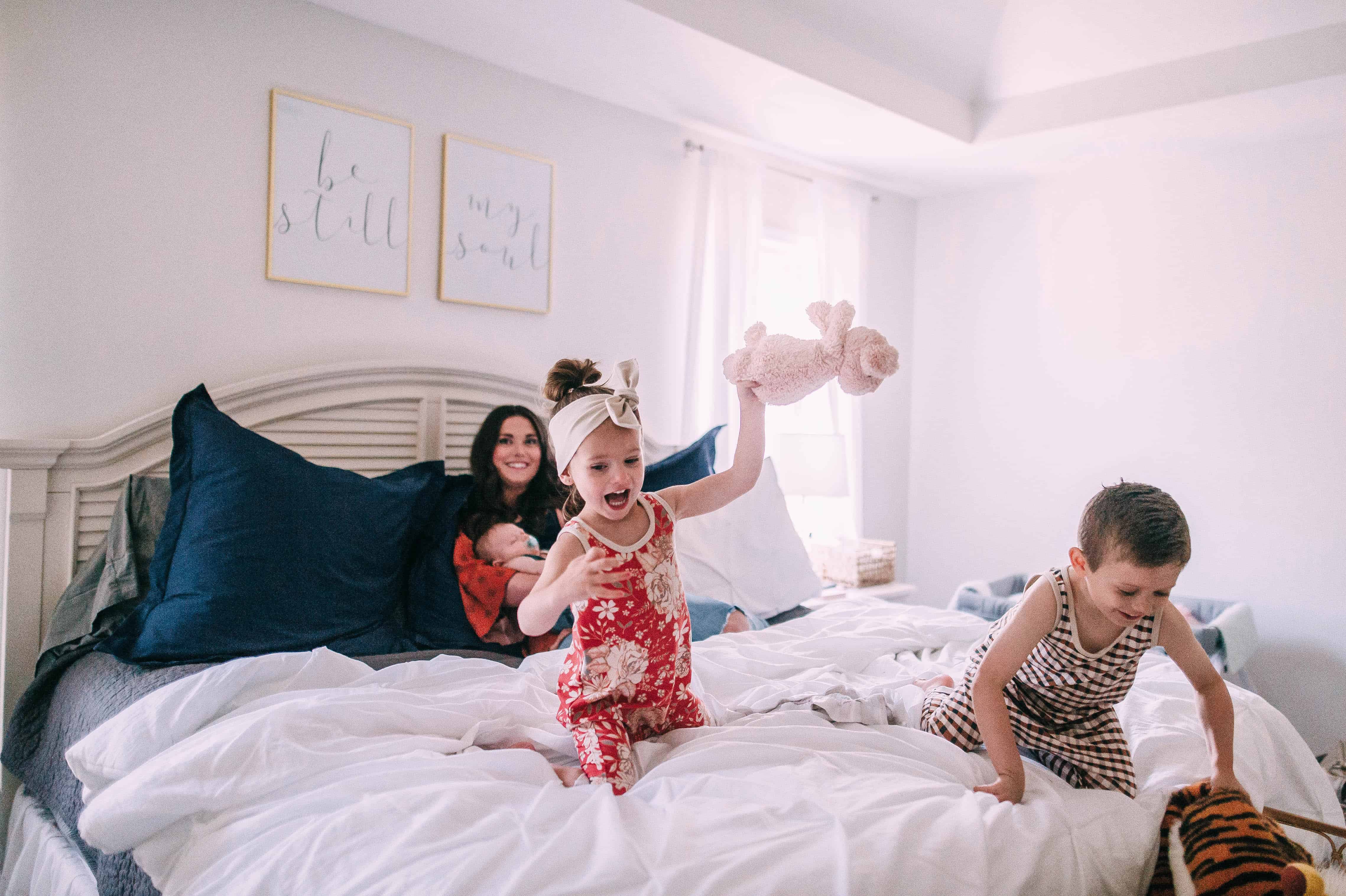 kids jumping on bed