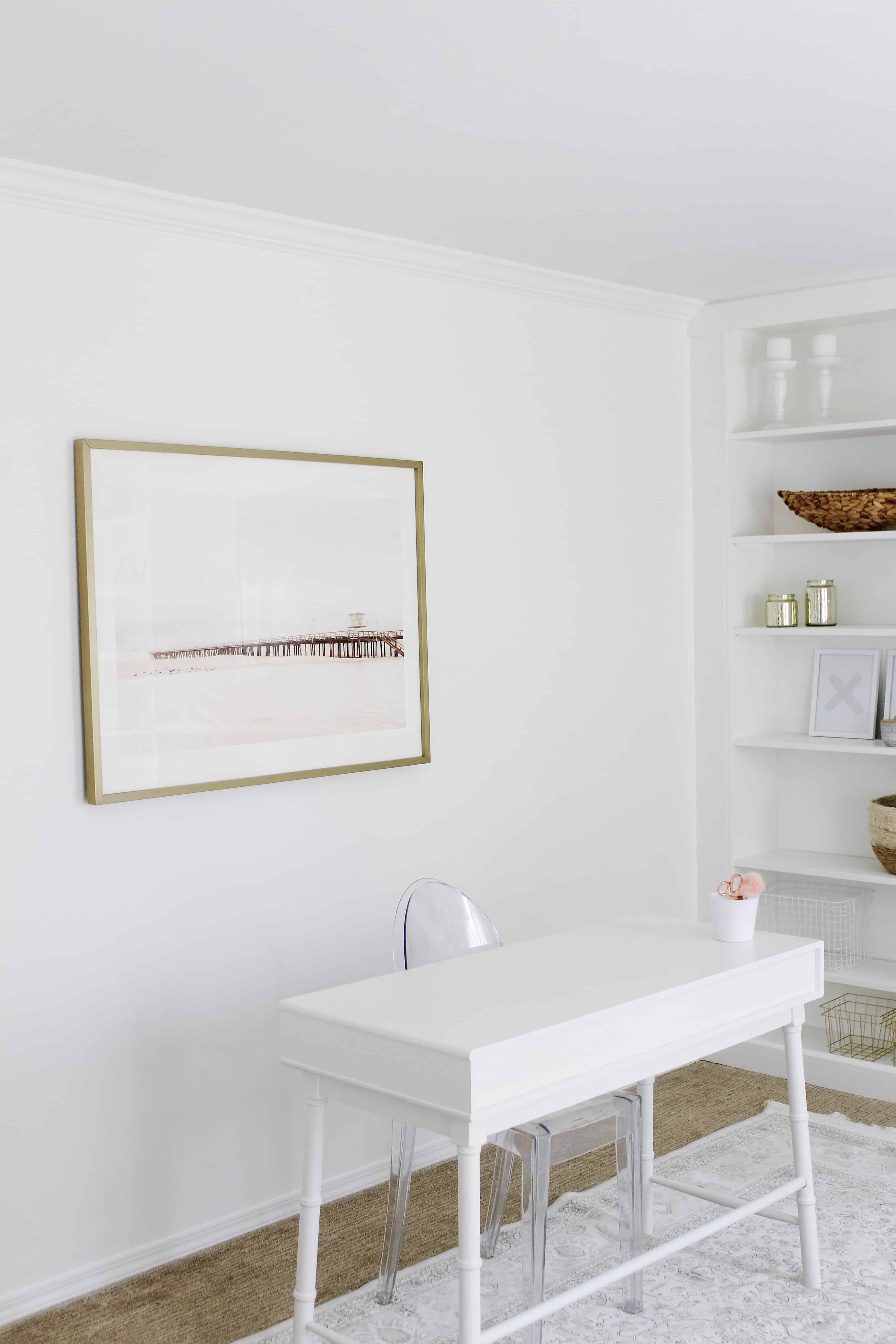 Minted Art over white desk