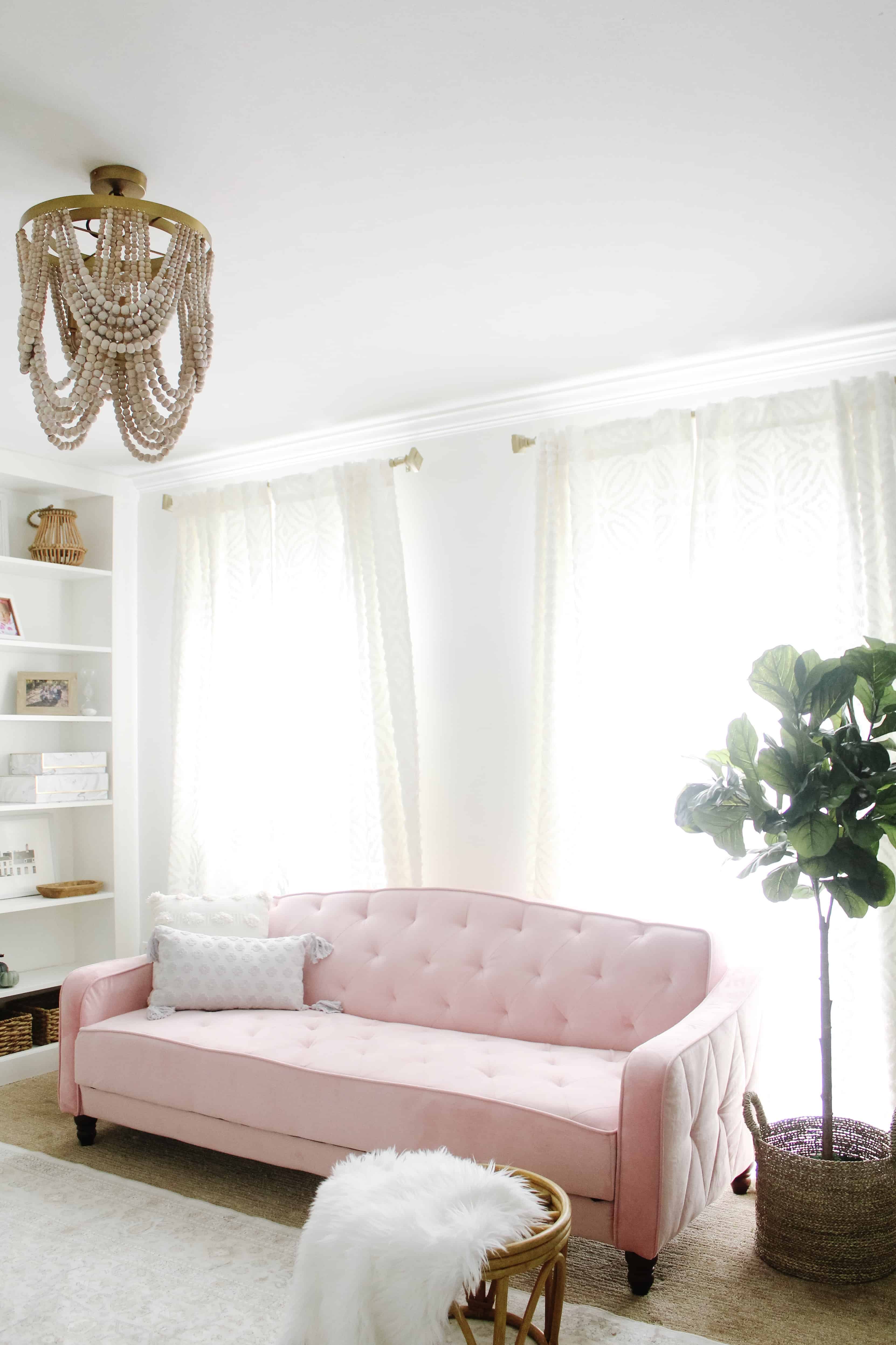 pink couch in home office