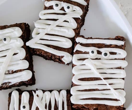 Mummy brownies on white plate