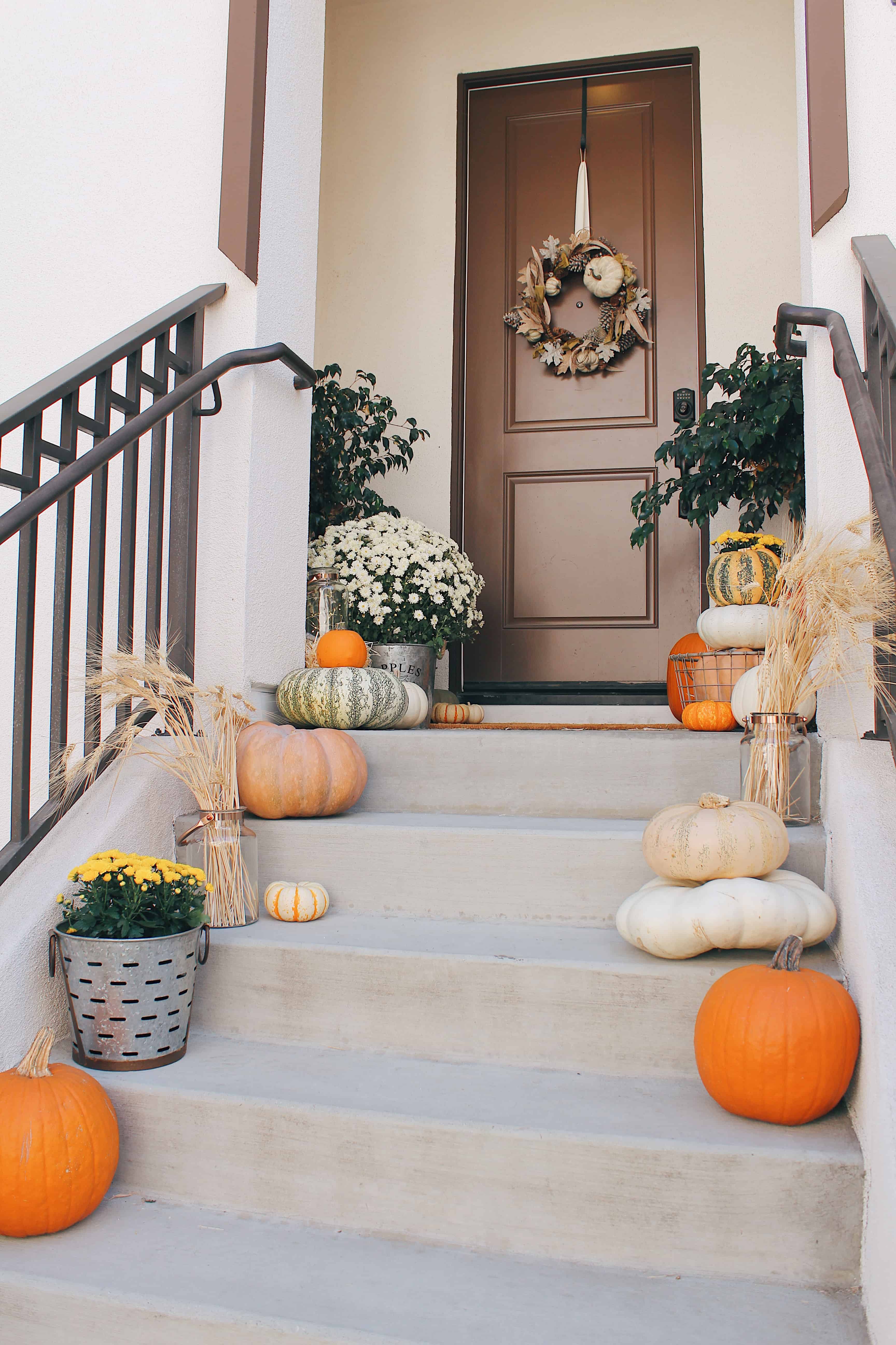 classic front porch with brown door