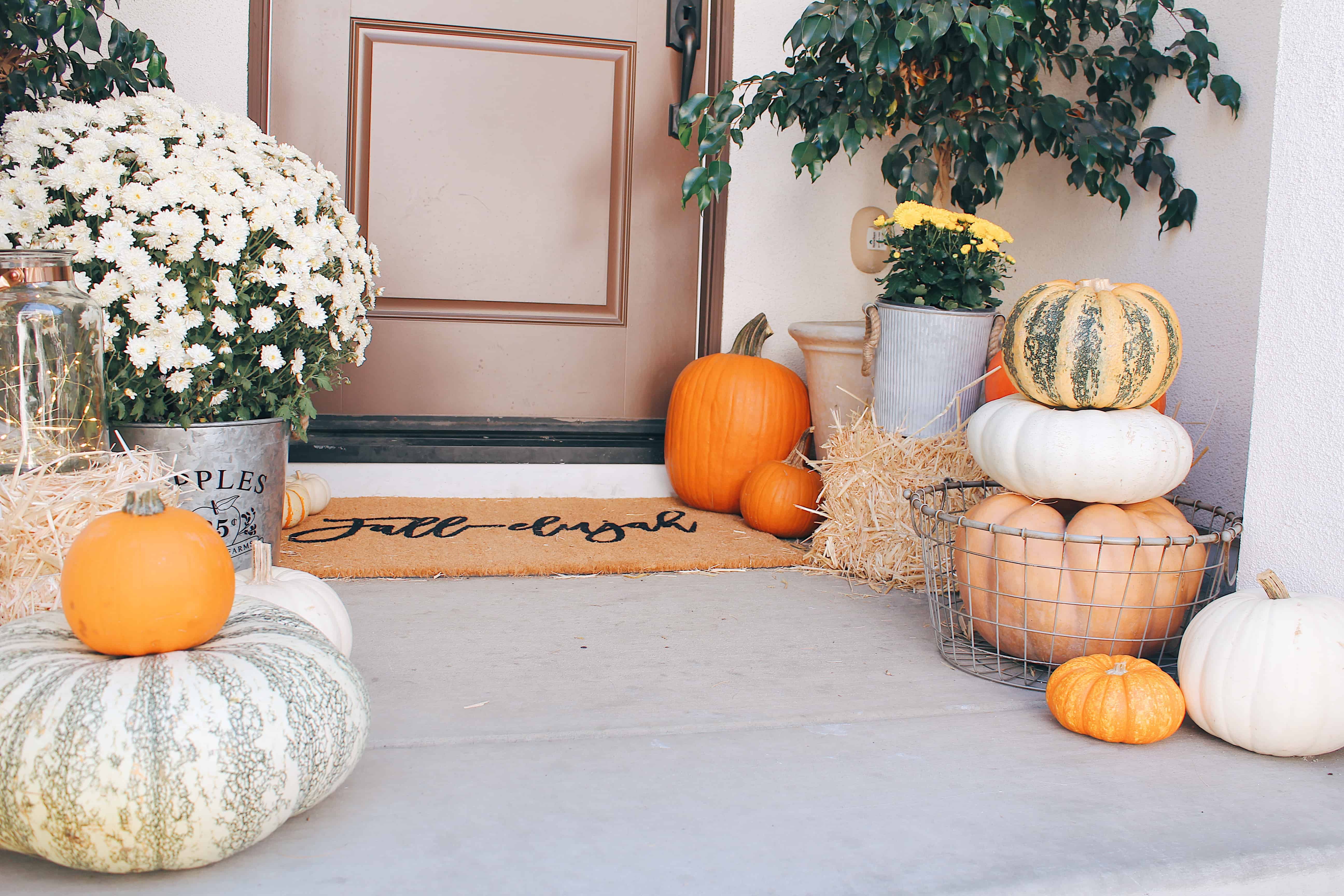 classic fall front porch with brown door