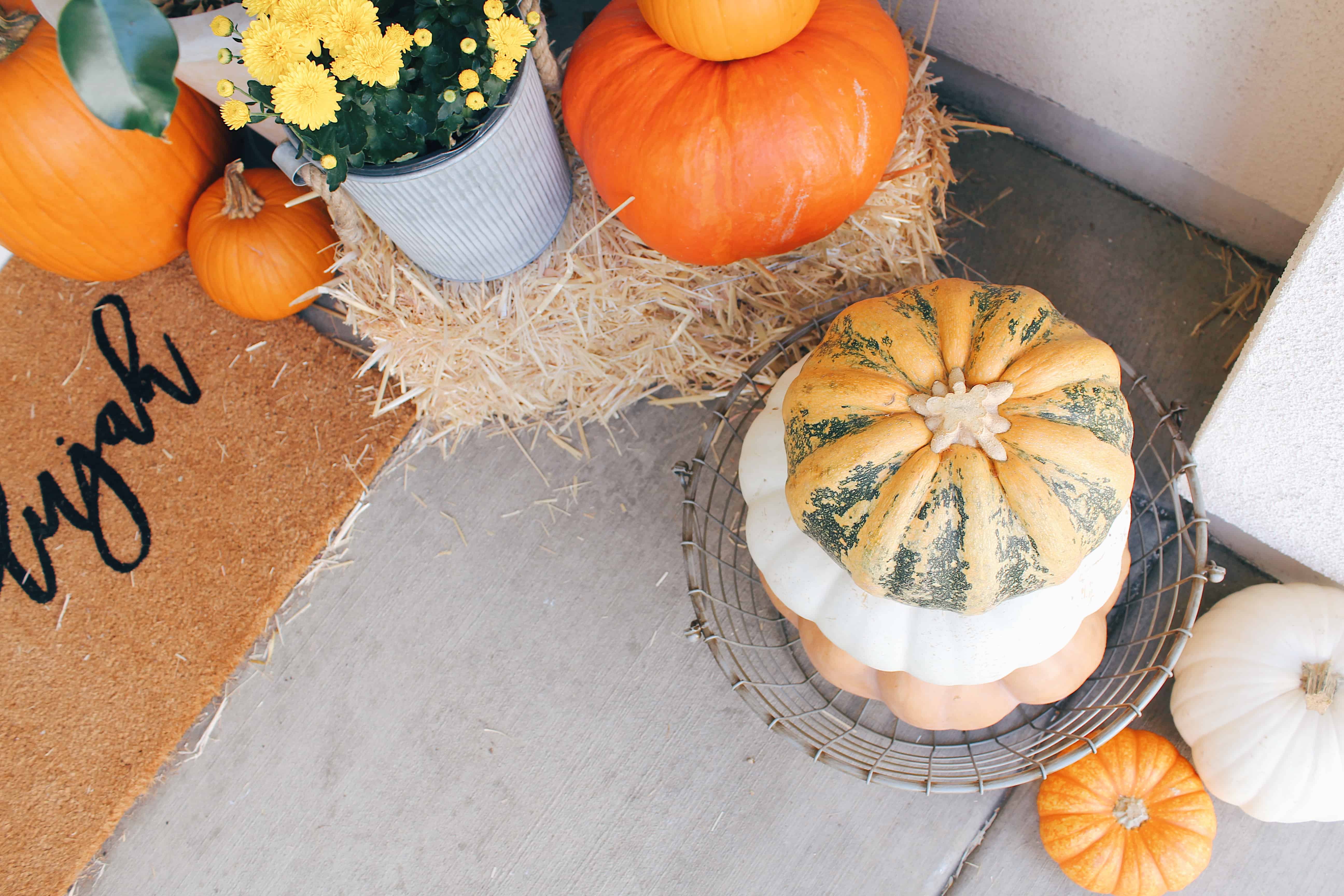 classic fall front porch with brown door