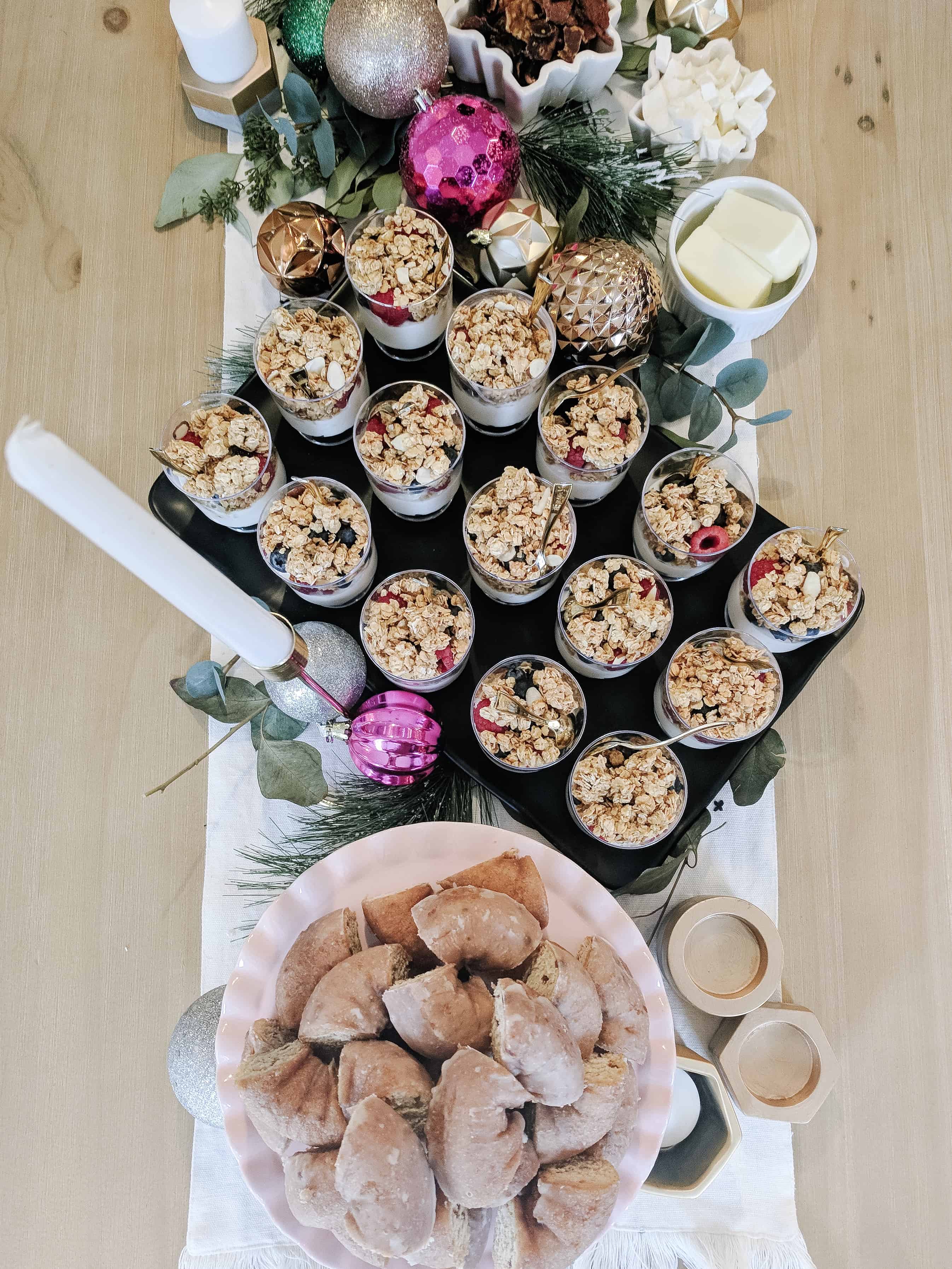 brunch table with donuts and mini yogurt parfaits