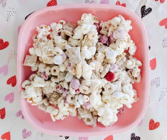 Best Toddler Valentines Day snack on a pink plate over a heart table cloth