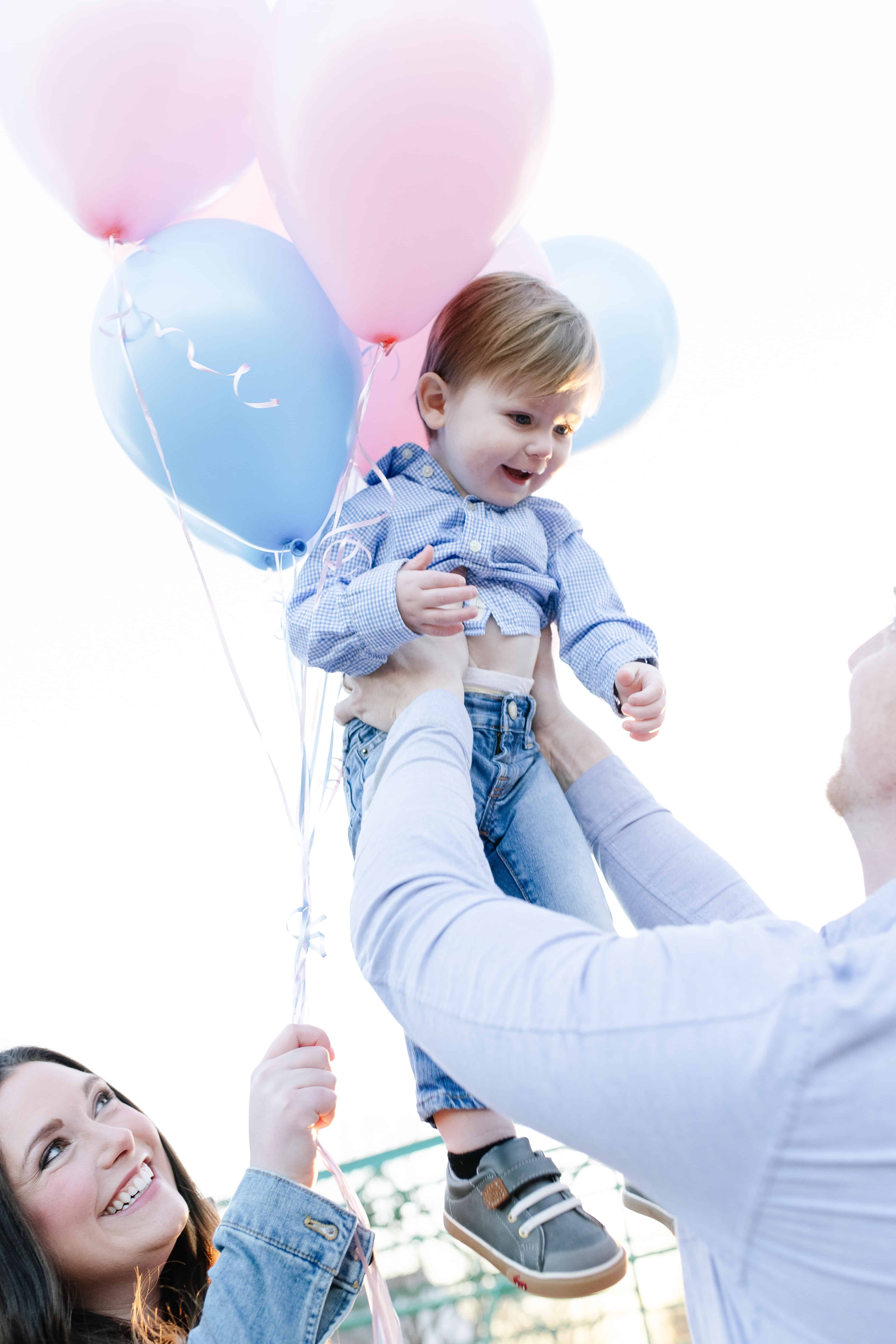 Baby boy with balloons