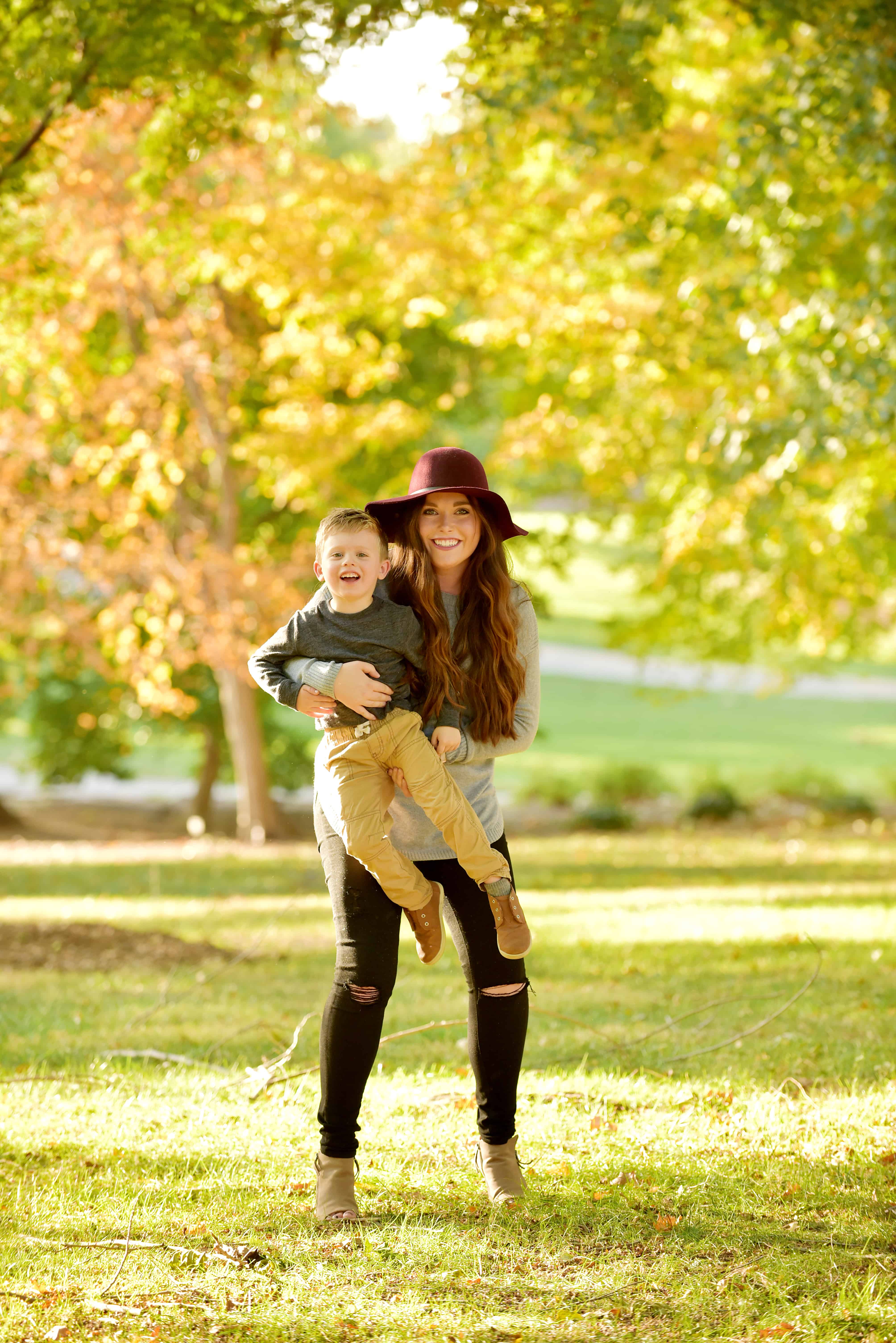 Mom holding little boy 