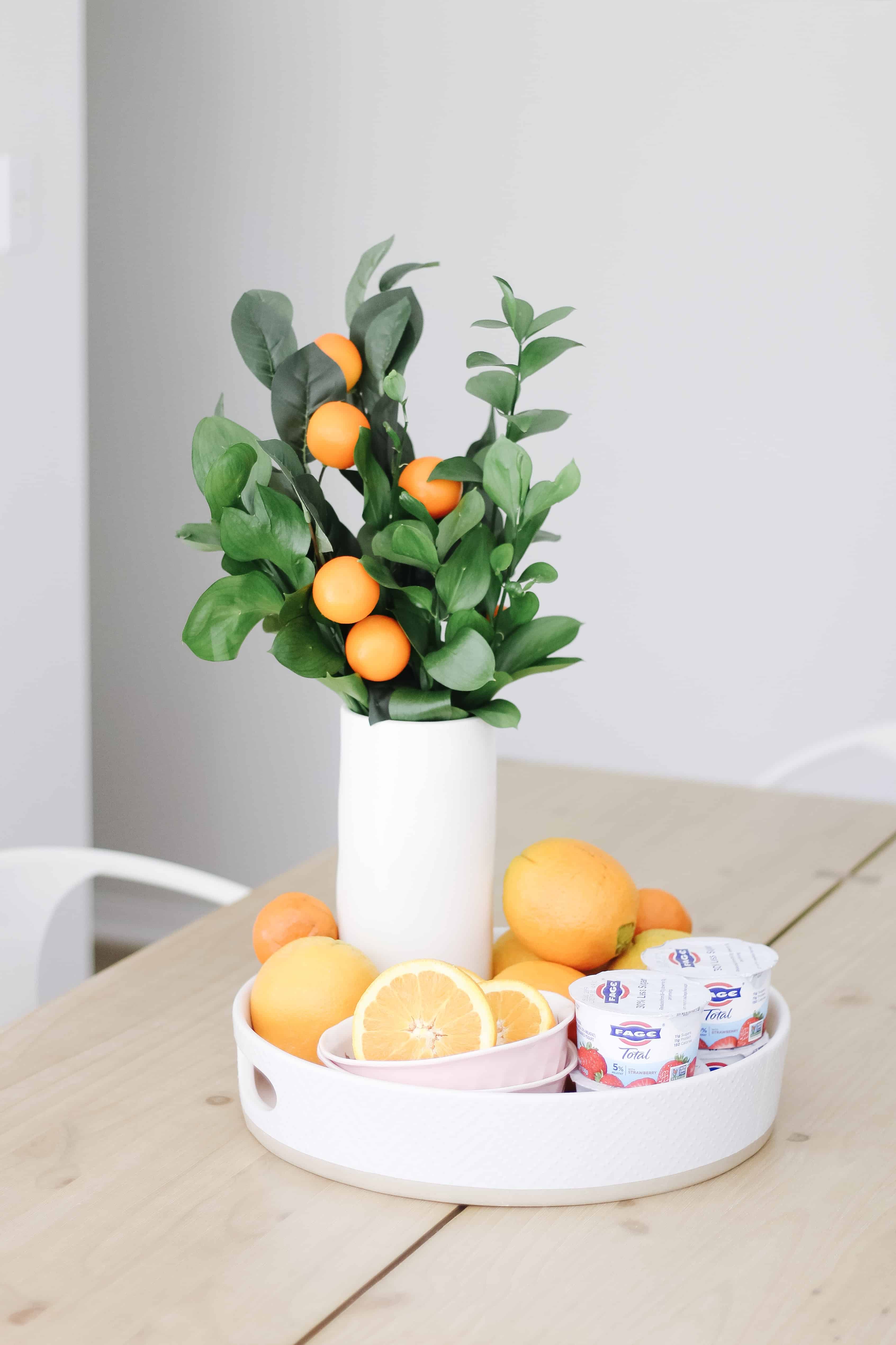 Fage yogurt and oranges in vase