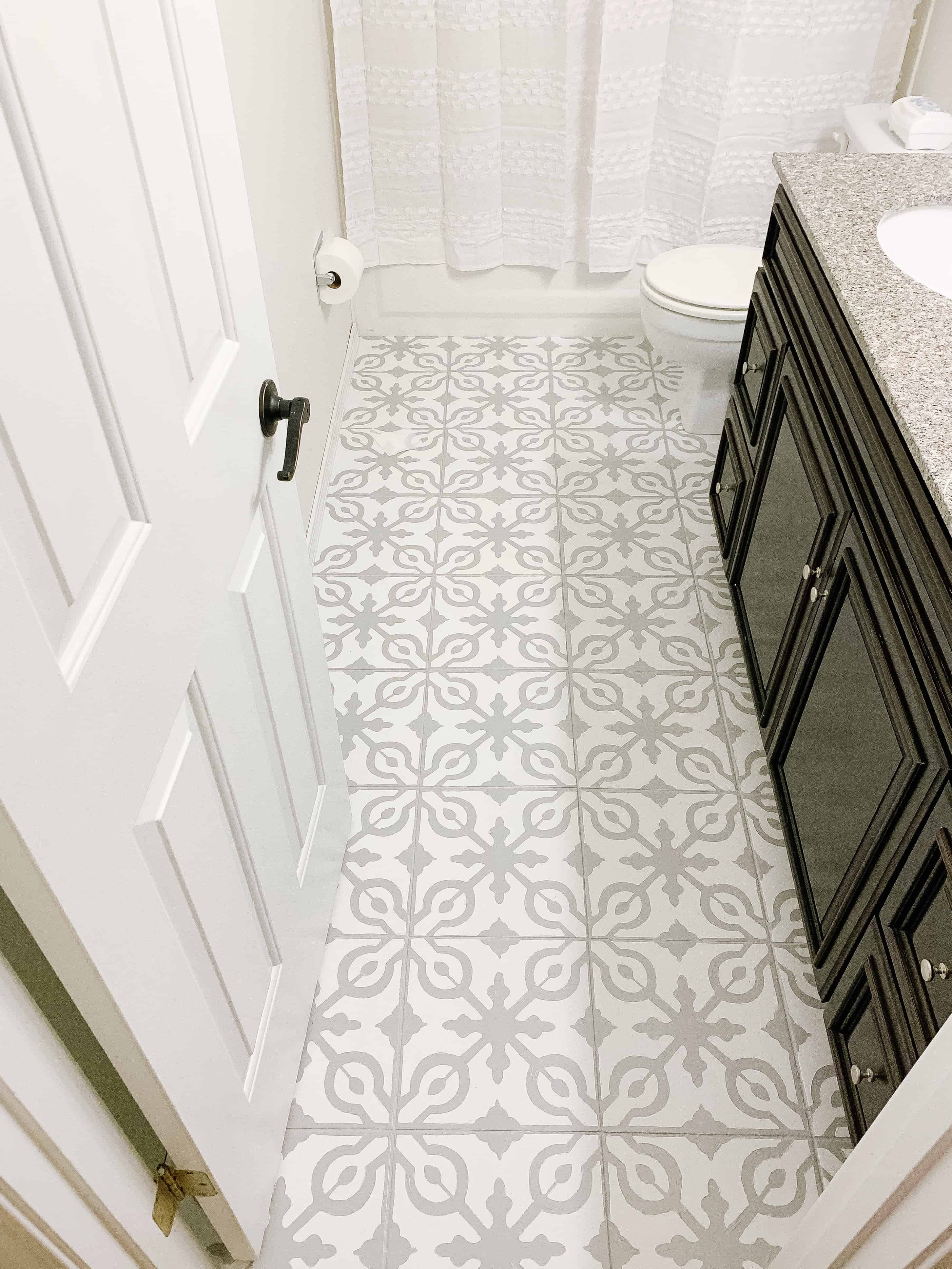 View of painted tile floor grey and white 