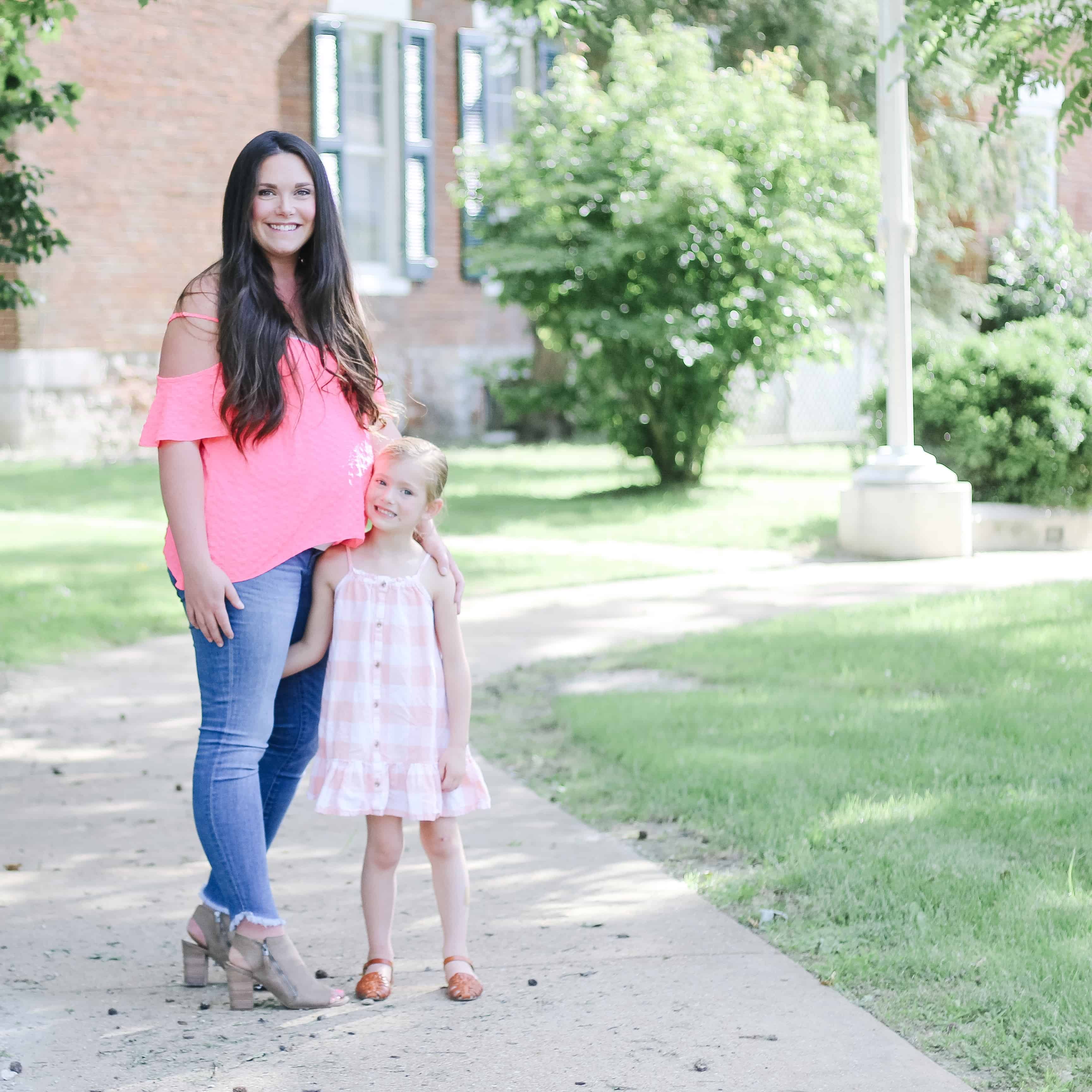 mom and toddler girl both in pink