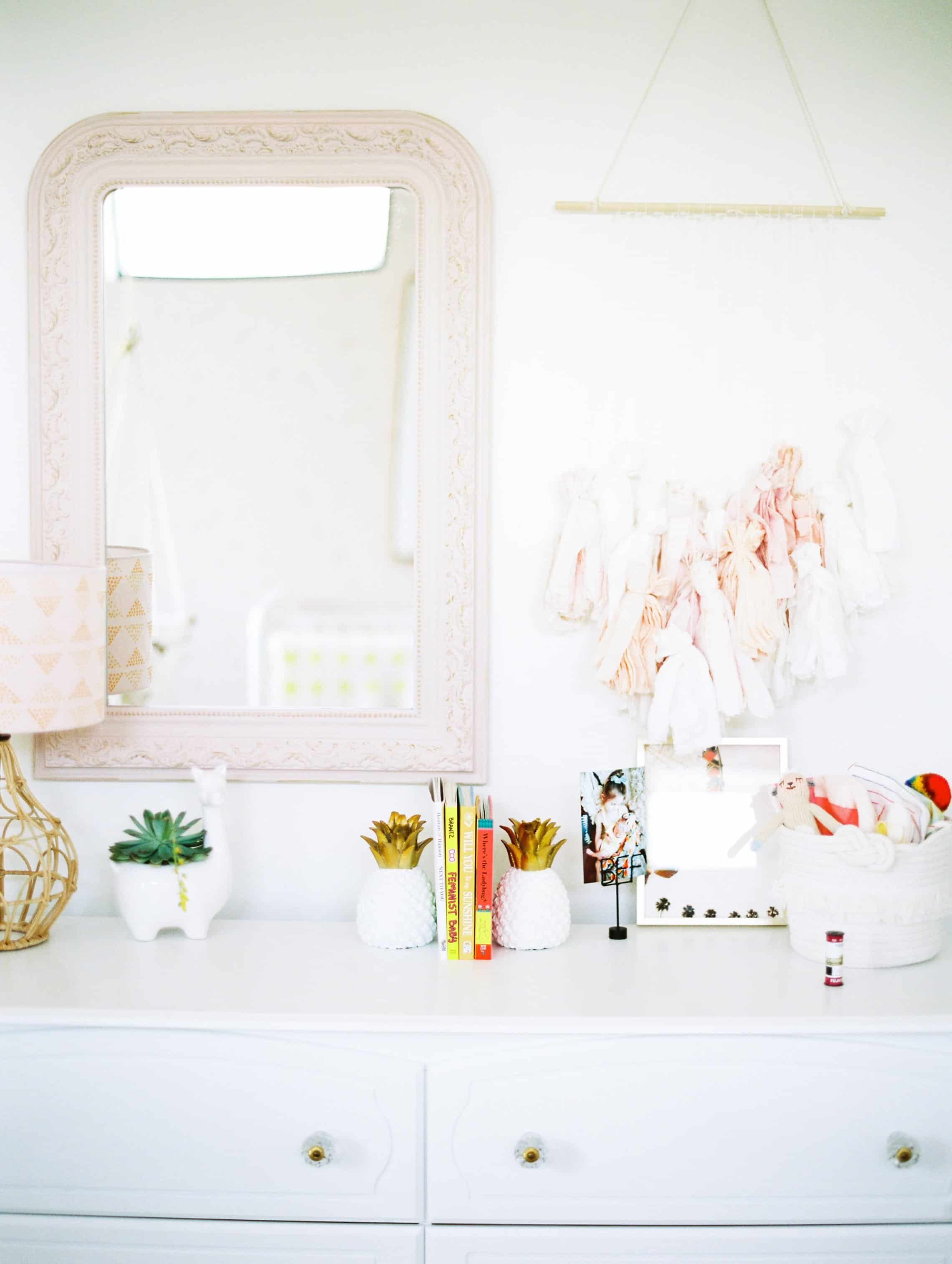 fun dresser in a pink boho nursery