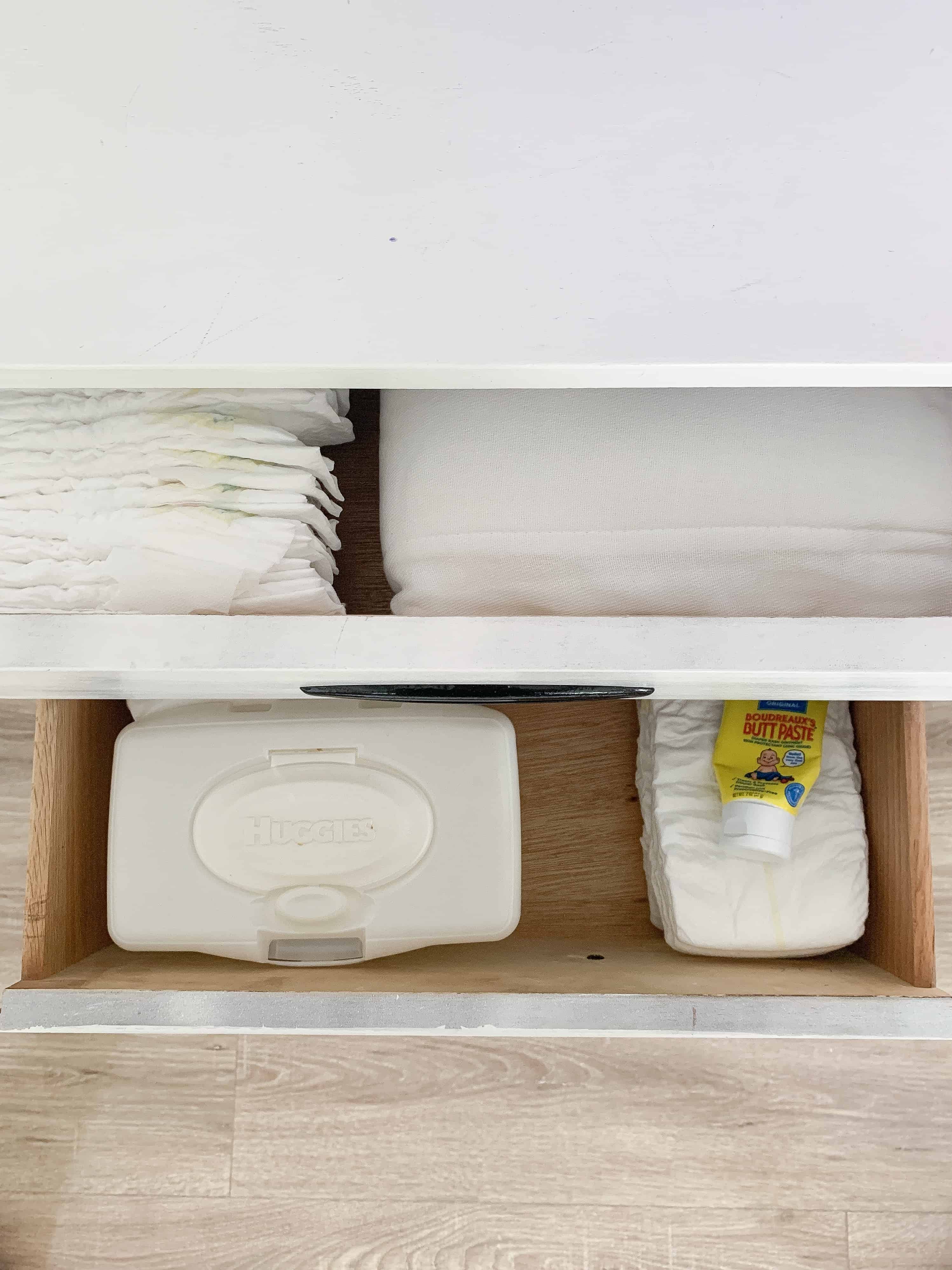 Entertainment Center drawer with baby essentials