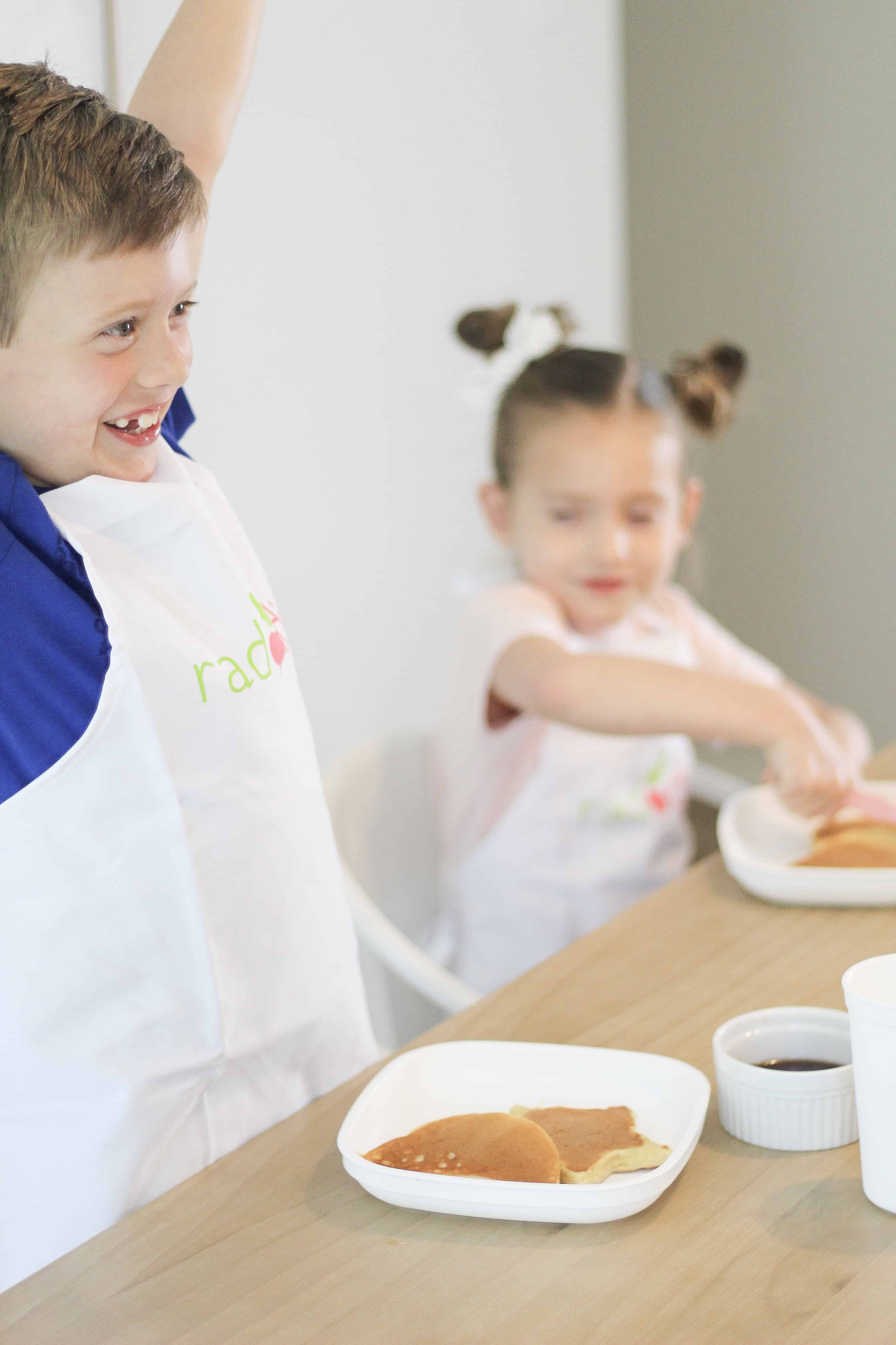 Kids eating food from Raddish Kit