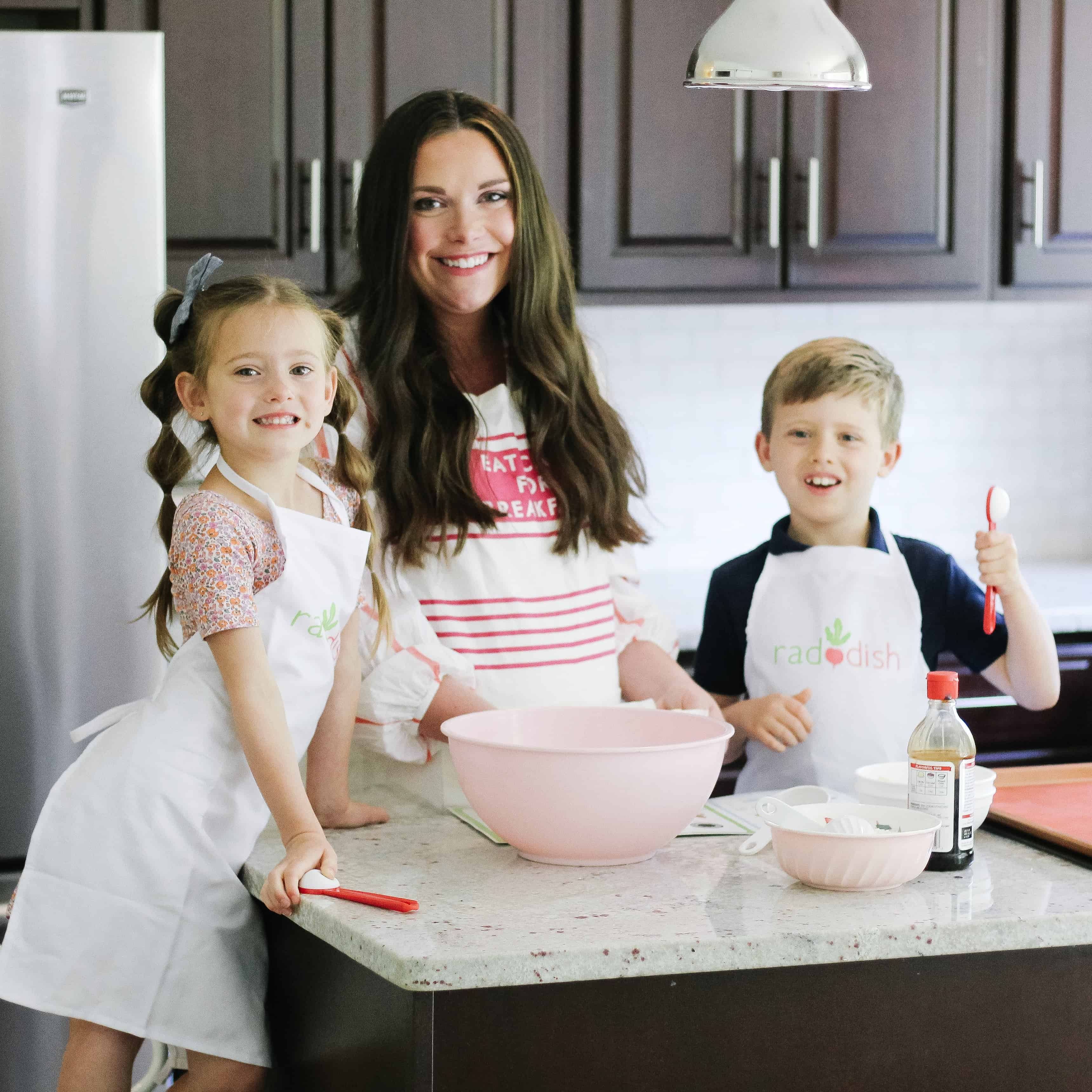 Kids and mom cooking raddish kids kit in kitchen