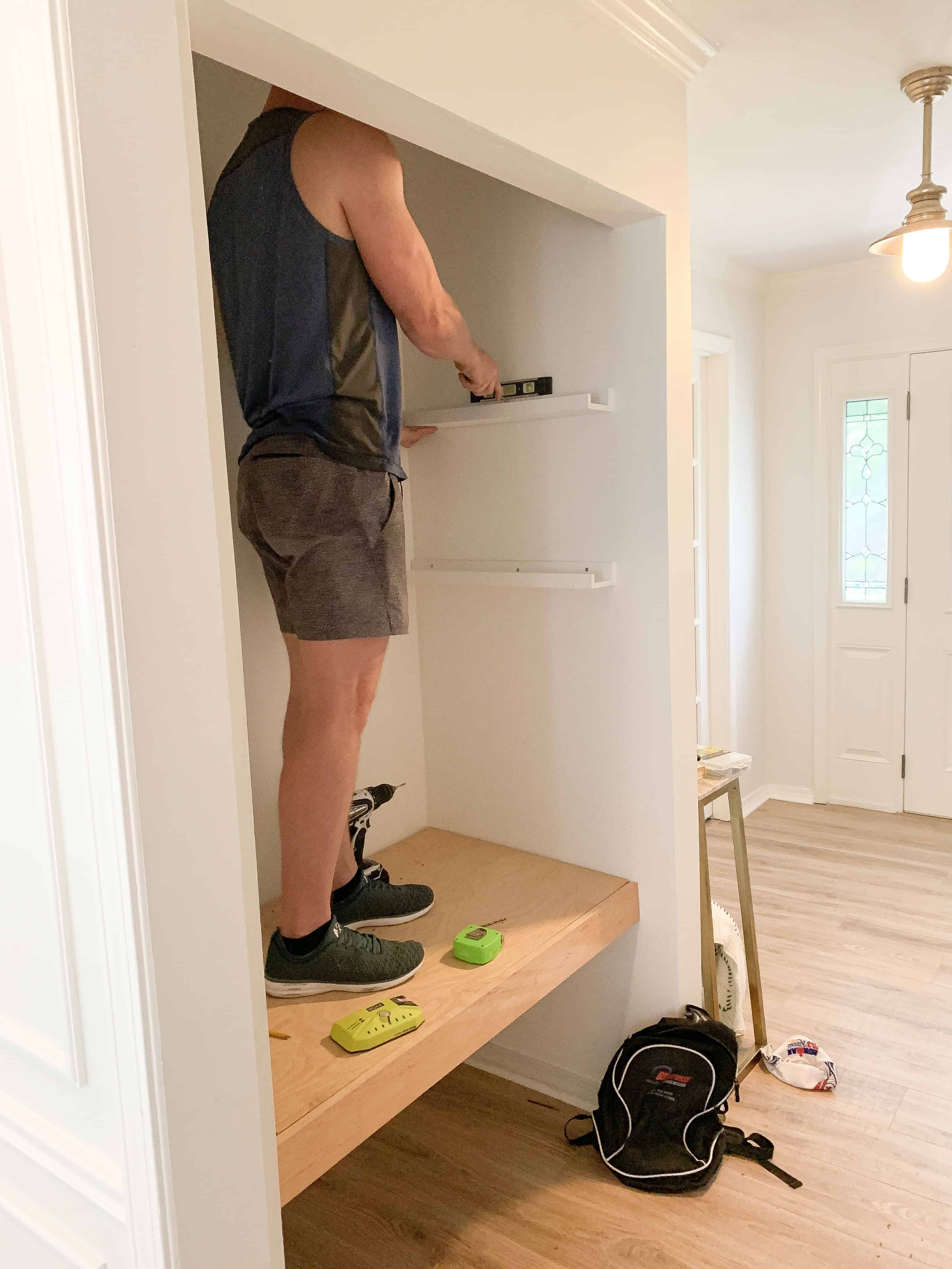 Hanging book ledges in Coat Closet Book Nook