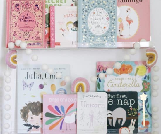 clear book ledges with children's books.