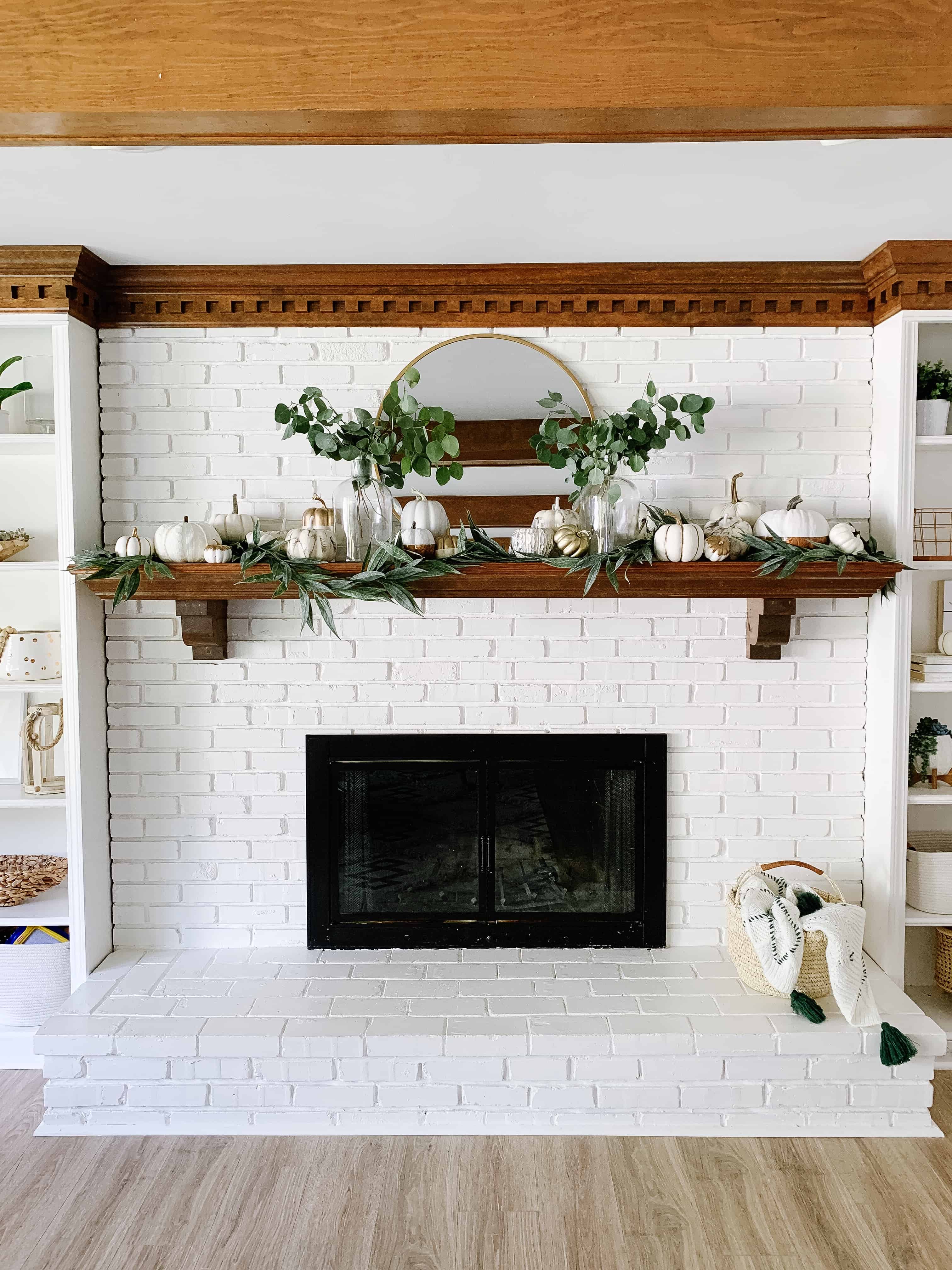 white fireplace with modern fall decor