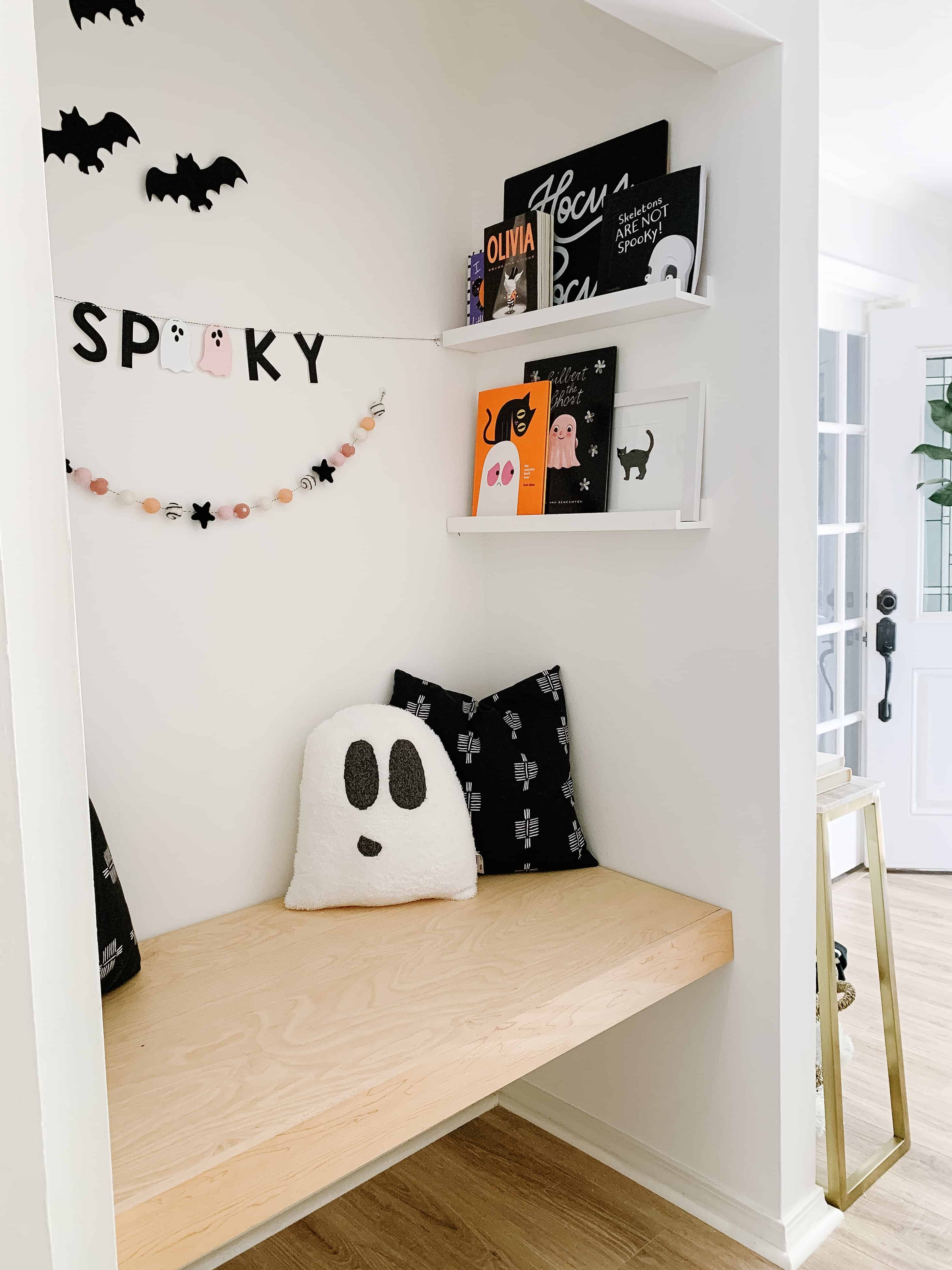 book nook with Halloween books and decor