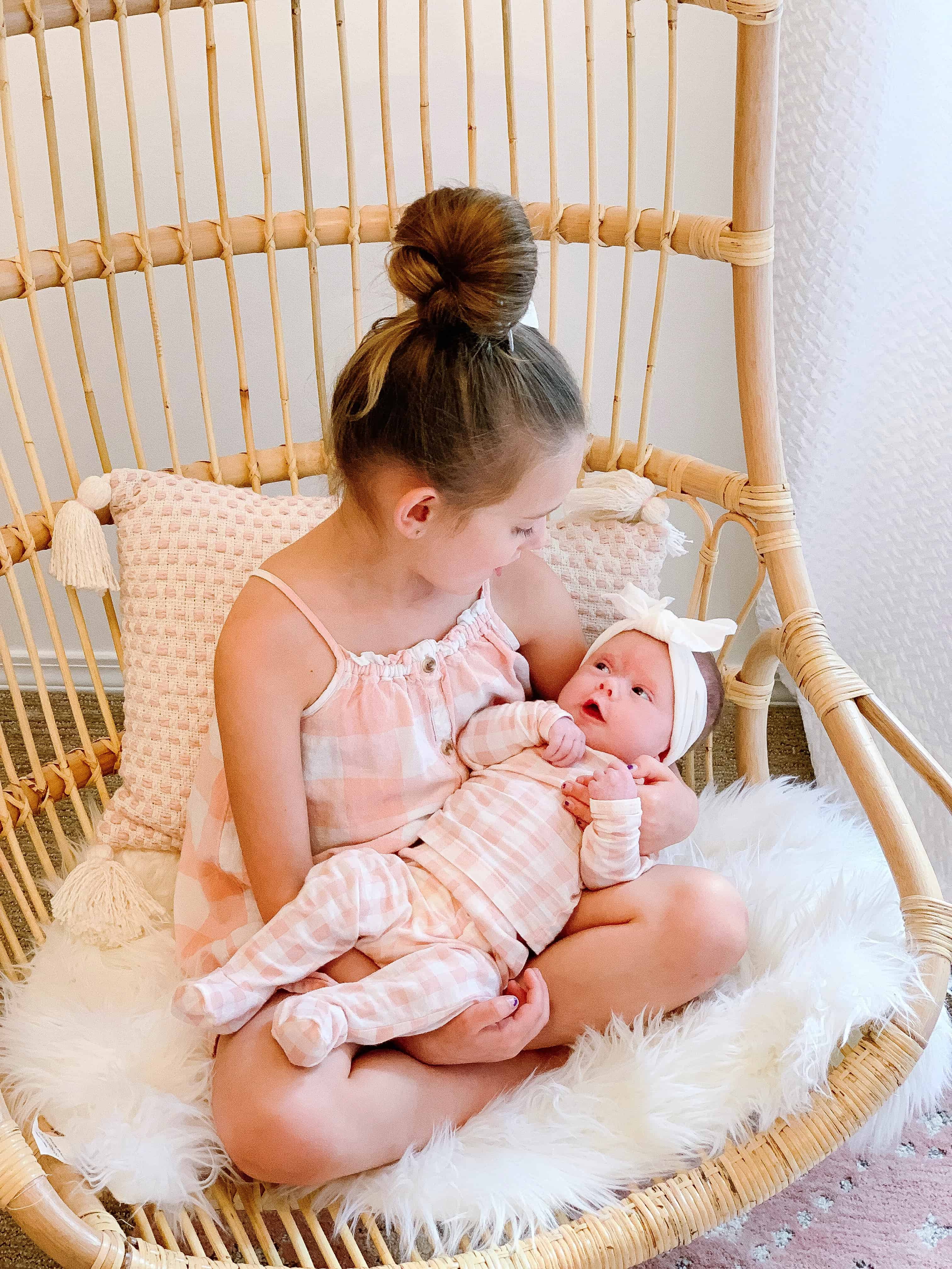 Sisters sitting in Serena and Lily Hanging Chair