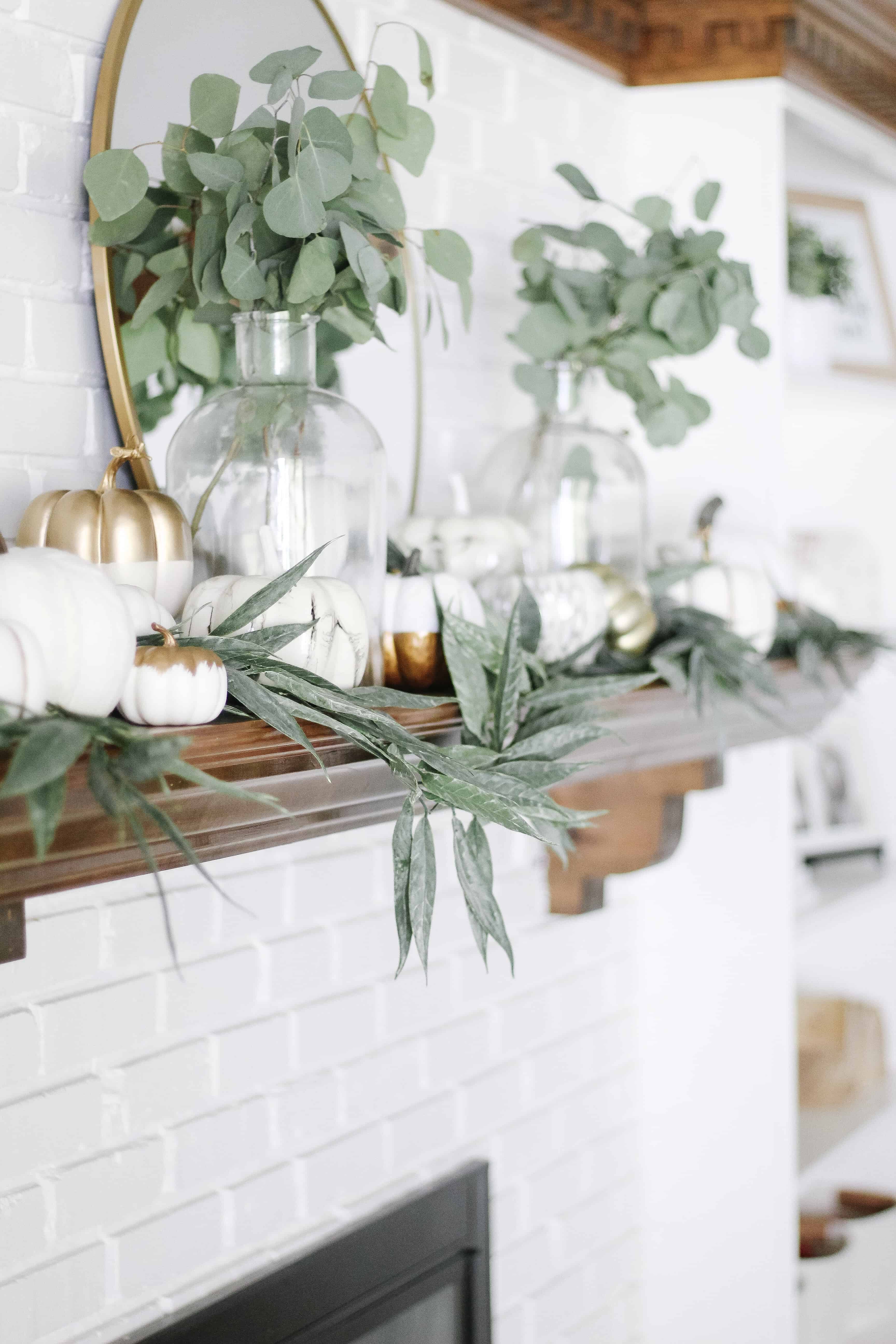 fall mantle decor with white pumpkins