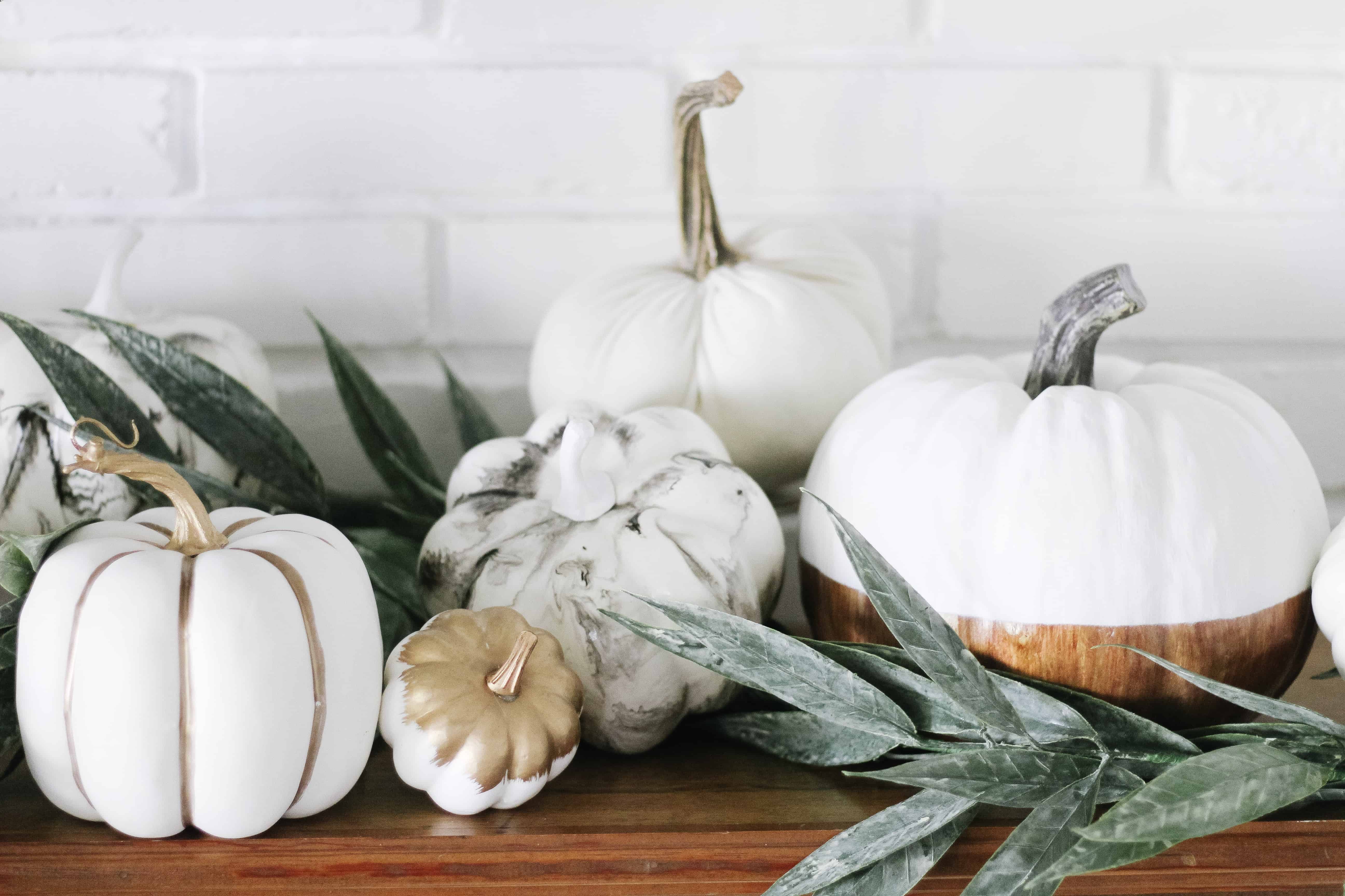 neutral pumpkins on mantle