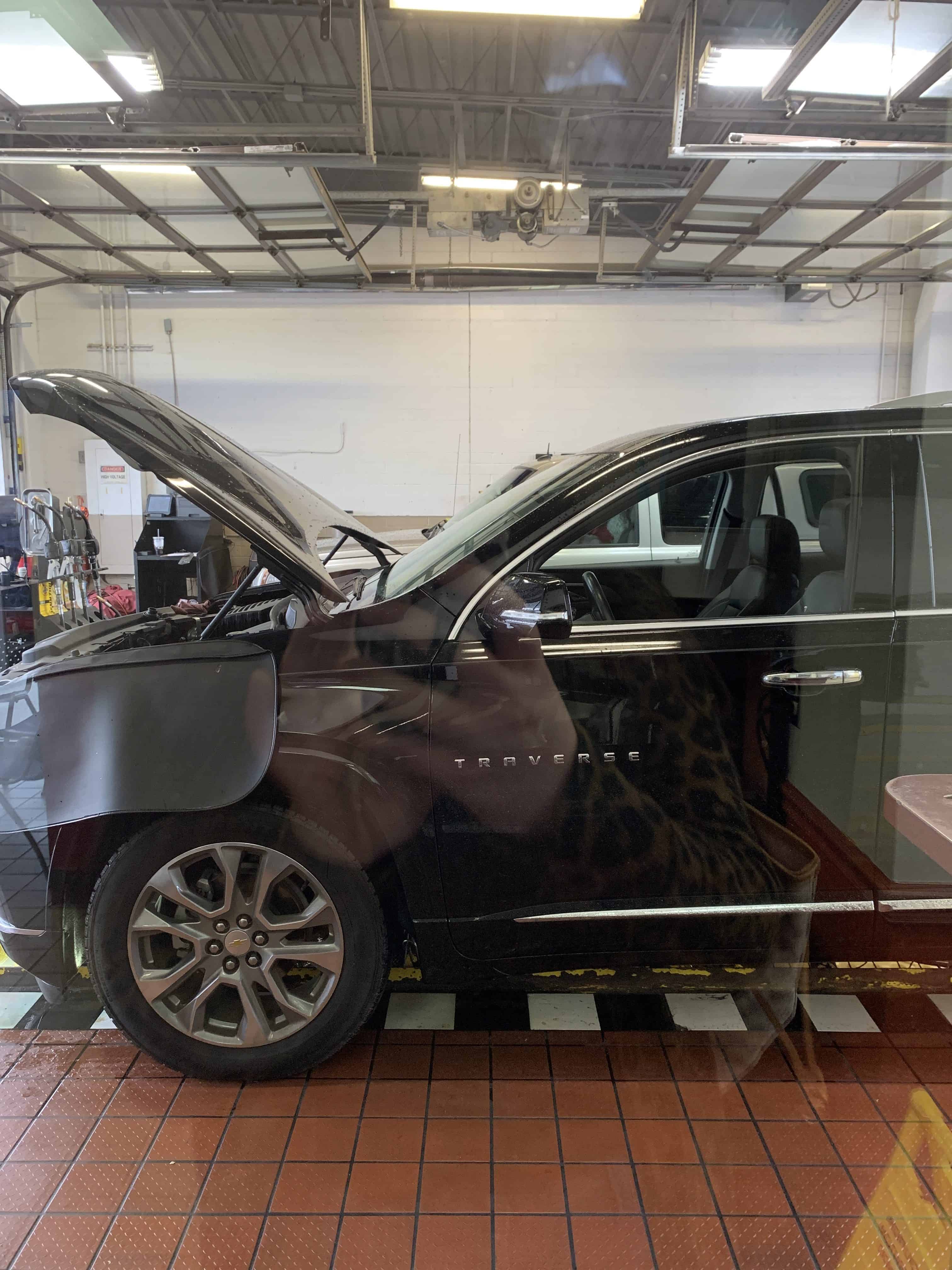 Chevvy Traverse getting oil changed at Jiffy Lube