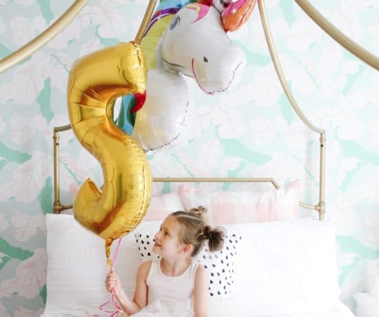 5 year old girl with balloon