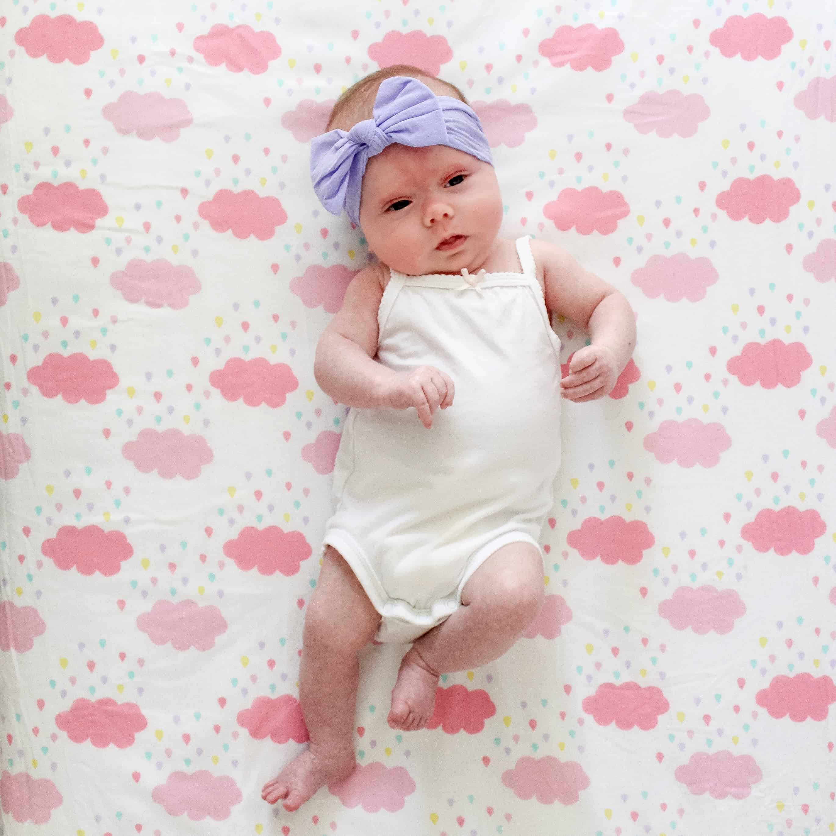 Baby girl on Pink Cloud sheet