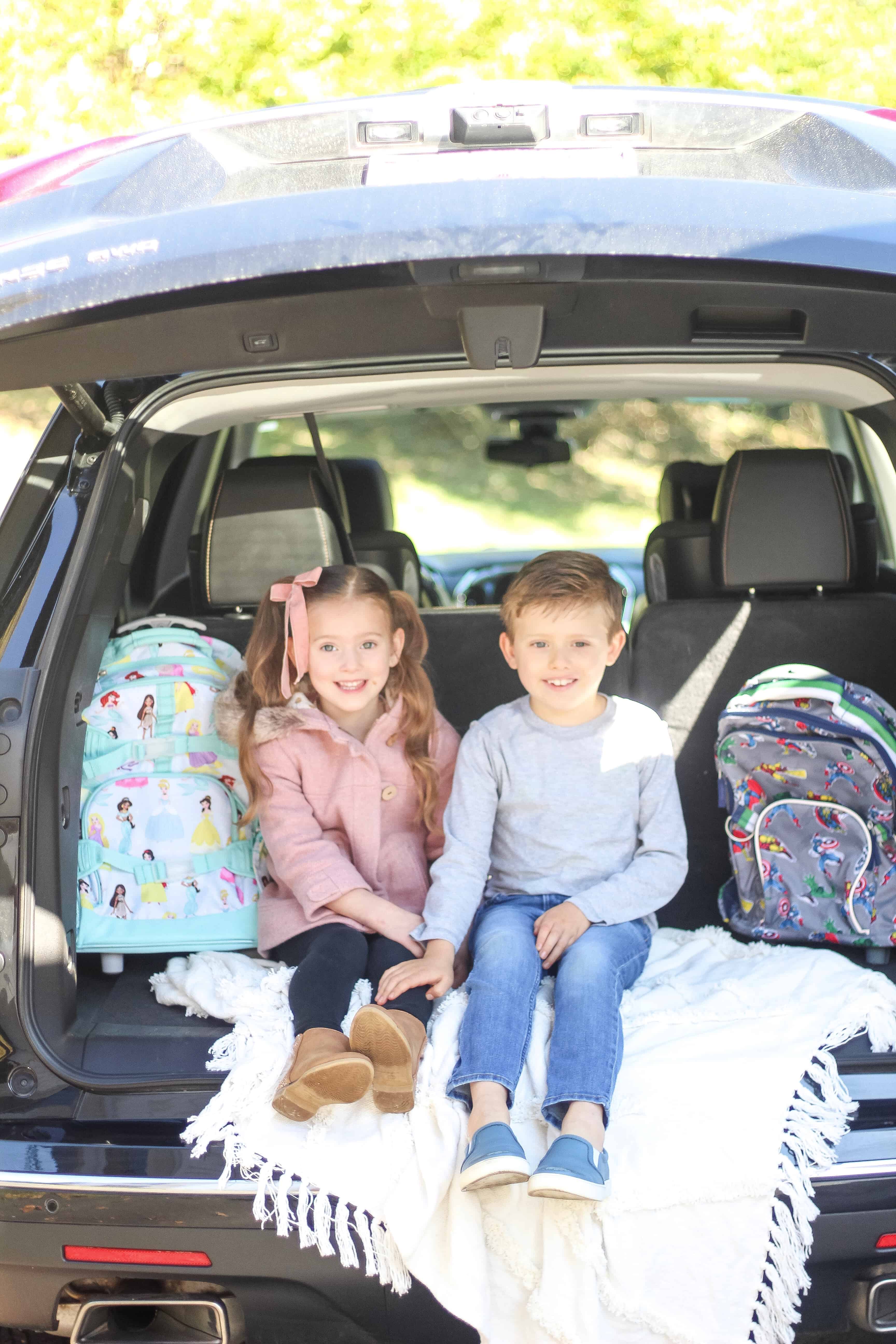 Kids in the back of chevvy traverse