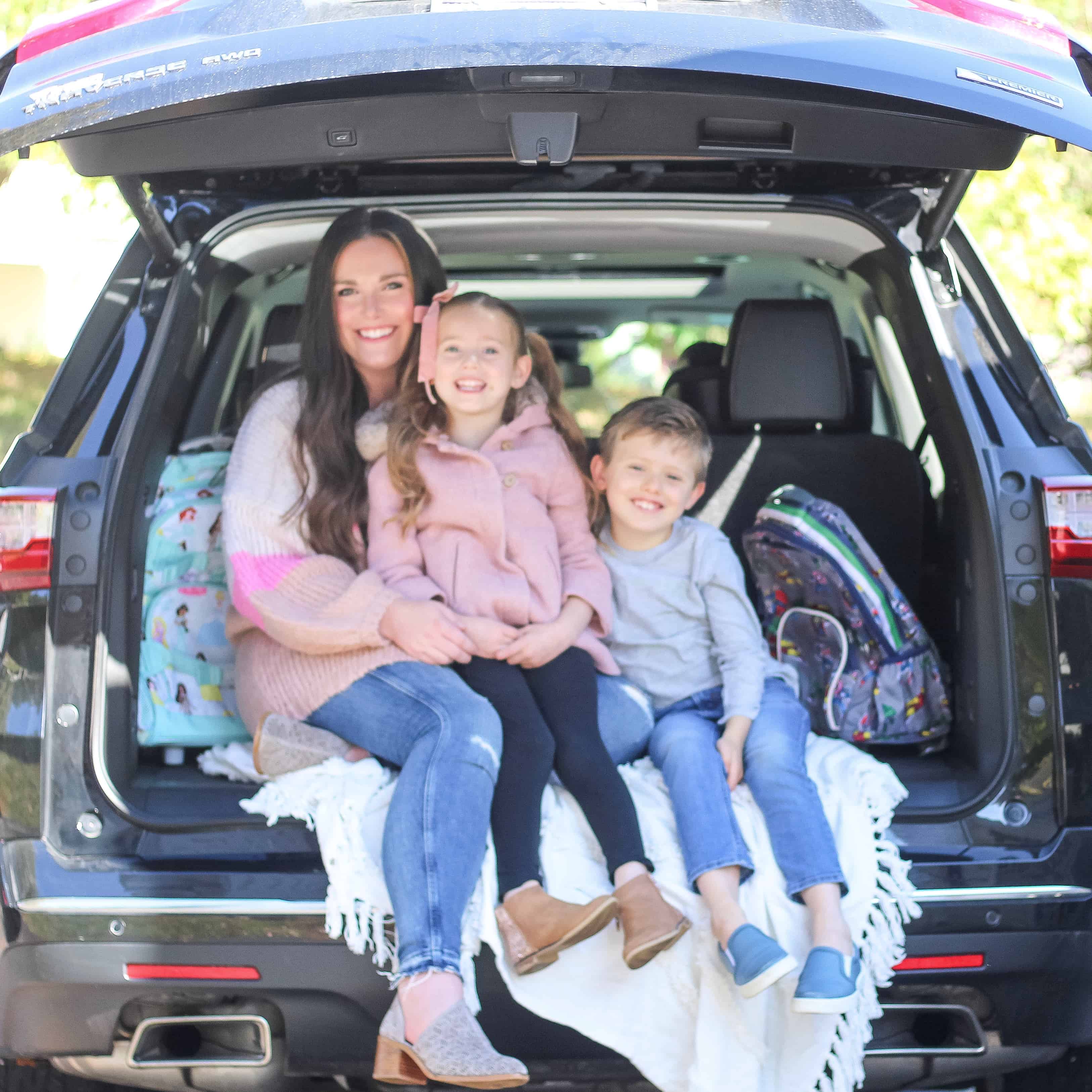 Mom and kids in the back of traverse