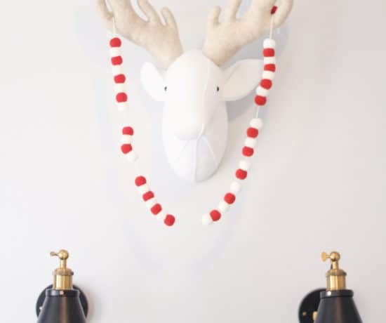 Felt Deer head on wall with Christmas Banner