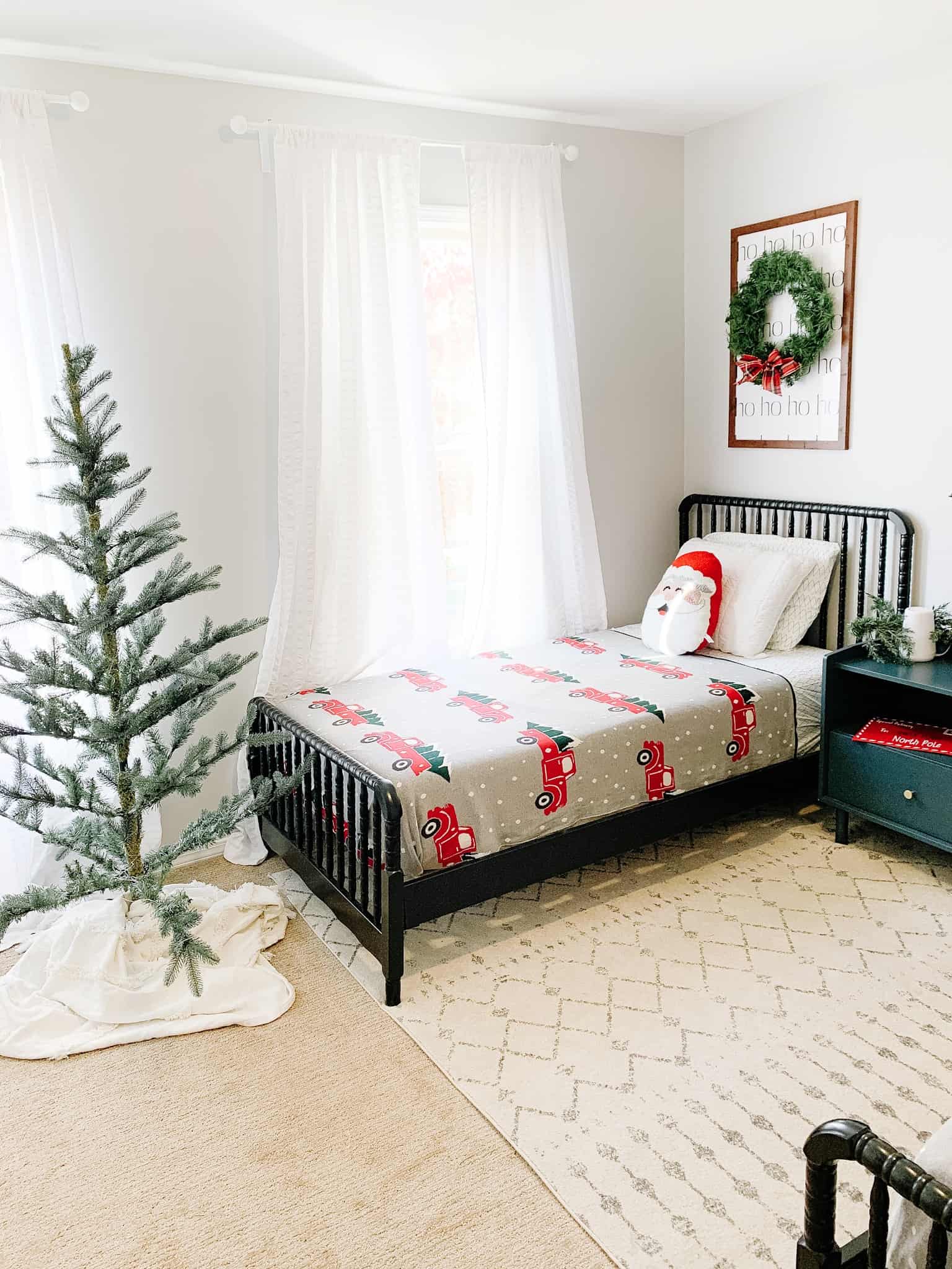 Boys room for Christmas with tree and Christmas Bedding