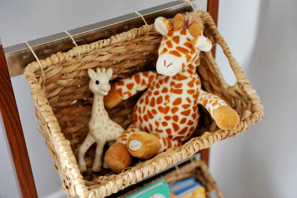 baskets with baby toy giraffes