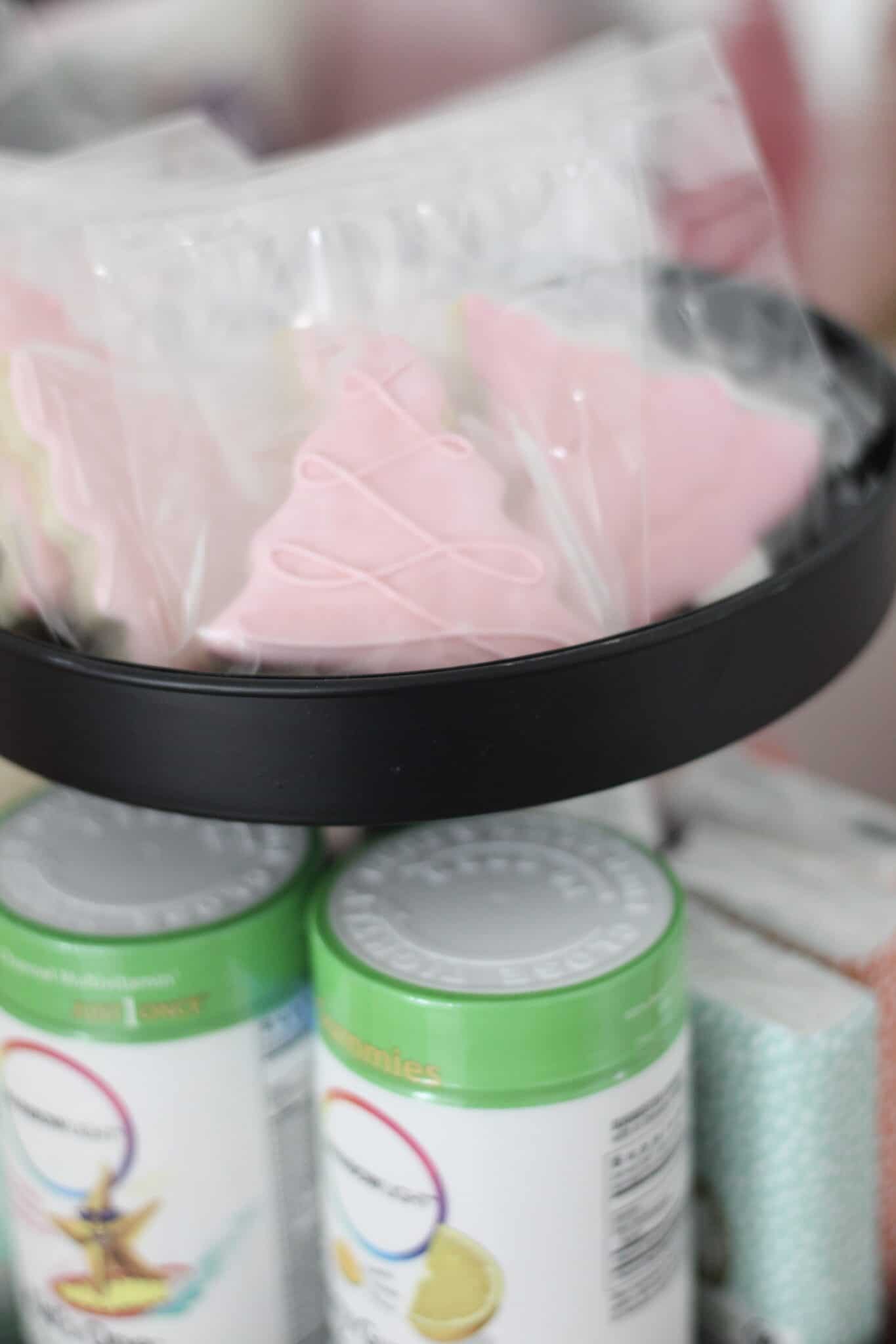 pink Christmas tree cookies on cake stand