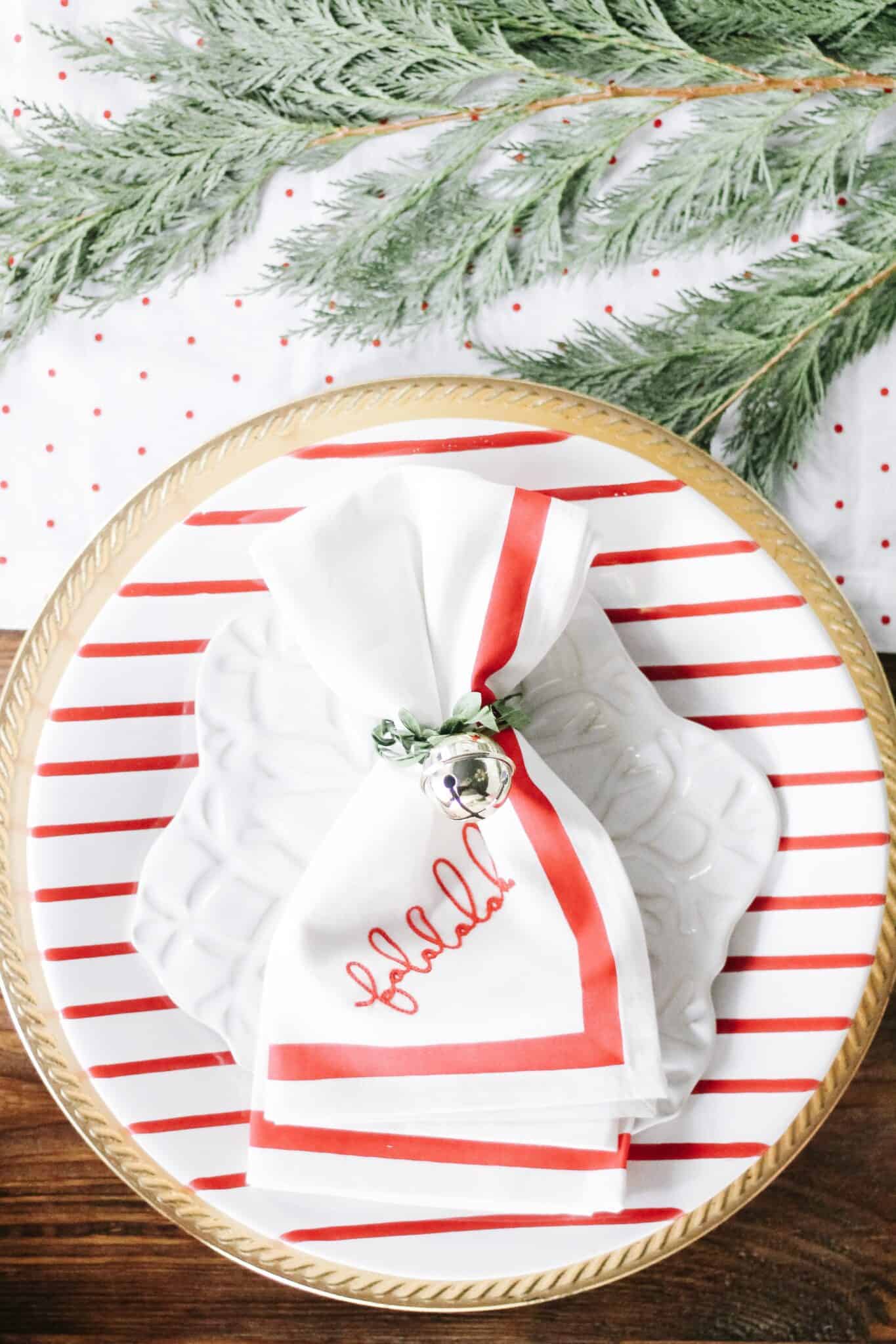 falala napkin on red striped candy cane plate